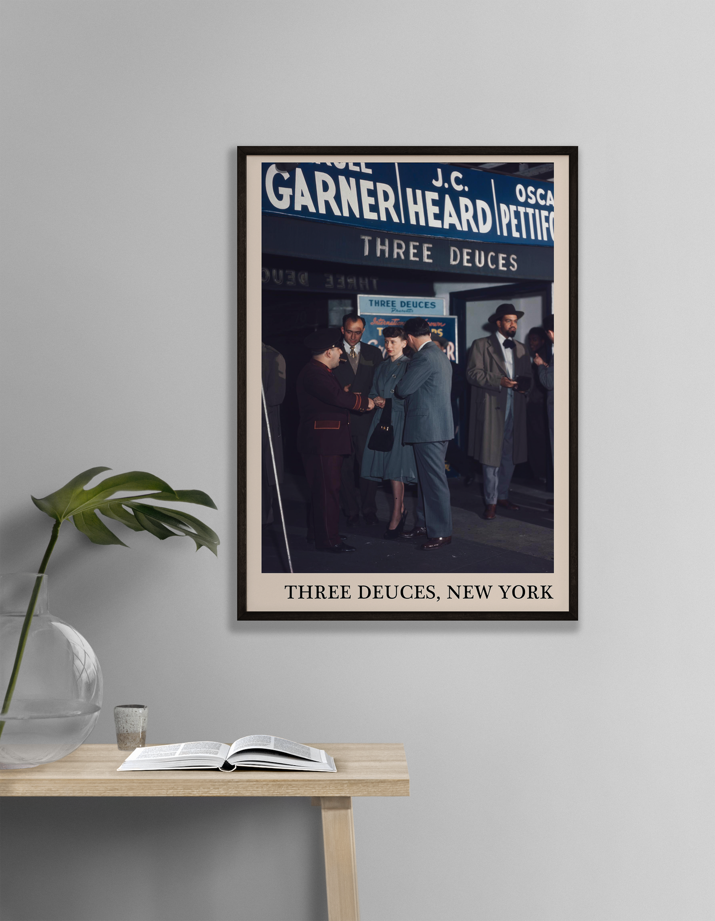 Iconic photo of the Three Deuces in New York captured in a retro black framed jazz venue print, hanging on a grey living room wall