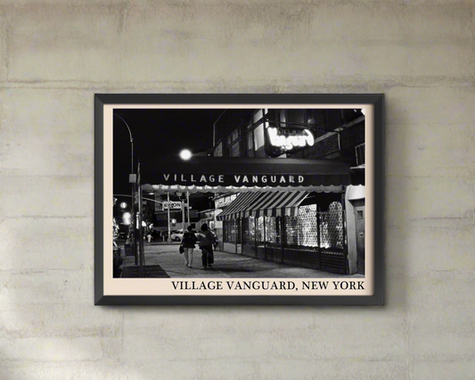 Iconic photo of Village Vanguard in New York taken by Thomas Marcello and captured in a retro black framed jazz poster, hanging on a grey concrete wall