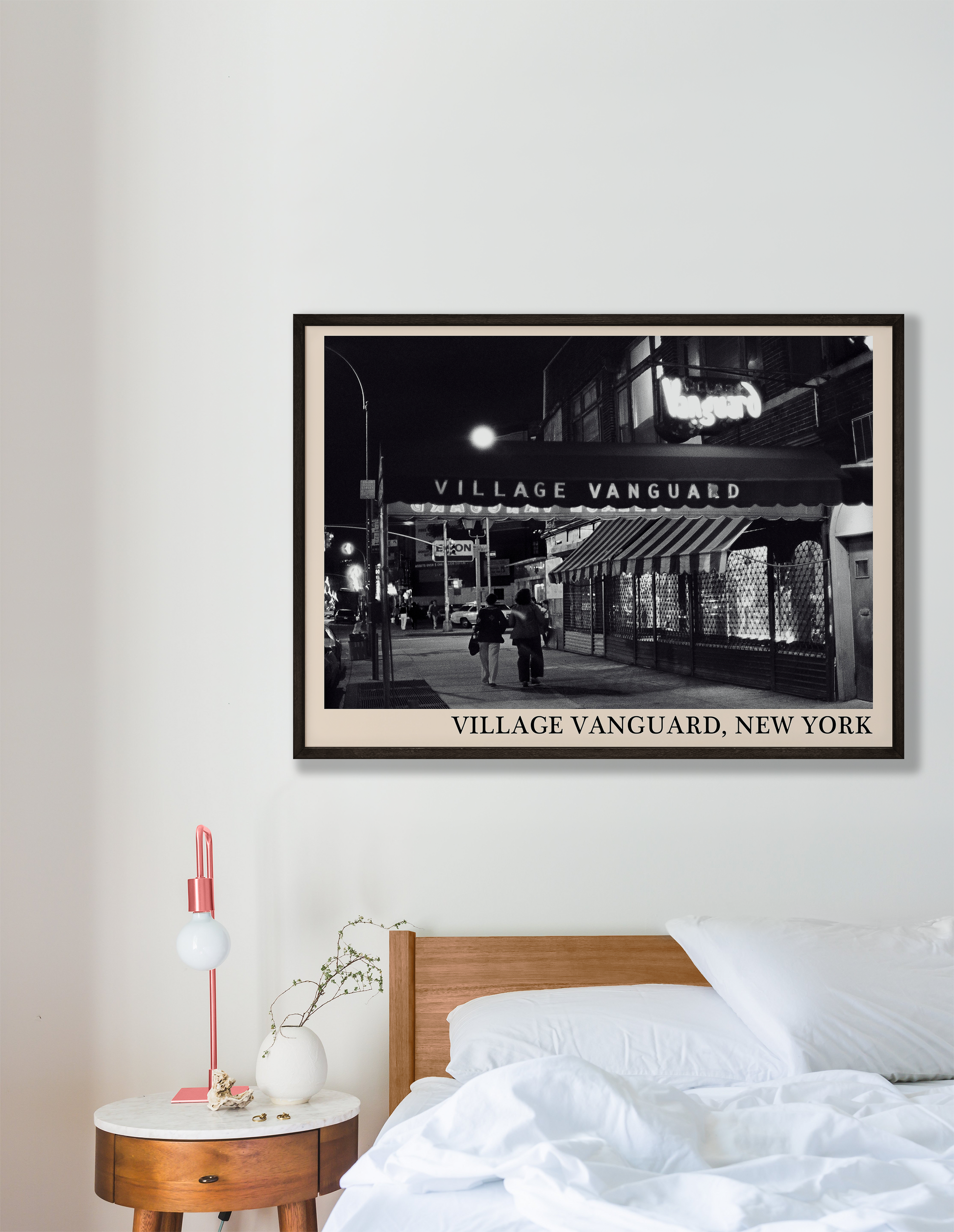 Iconic photo of Village Vanguard in New York taken by Thomas Marcello and captured in a retro black framed jazz print, hanging on a white bedroom wall