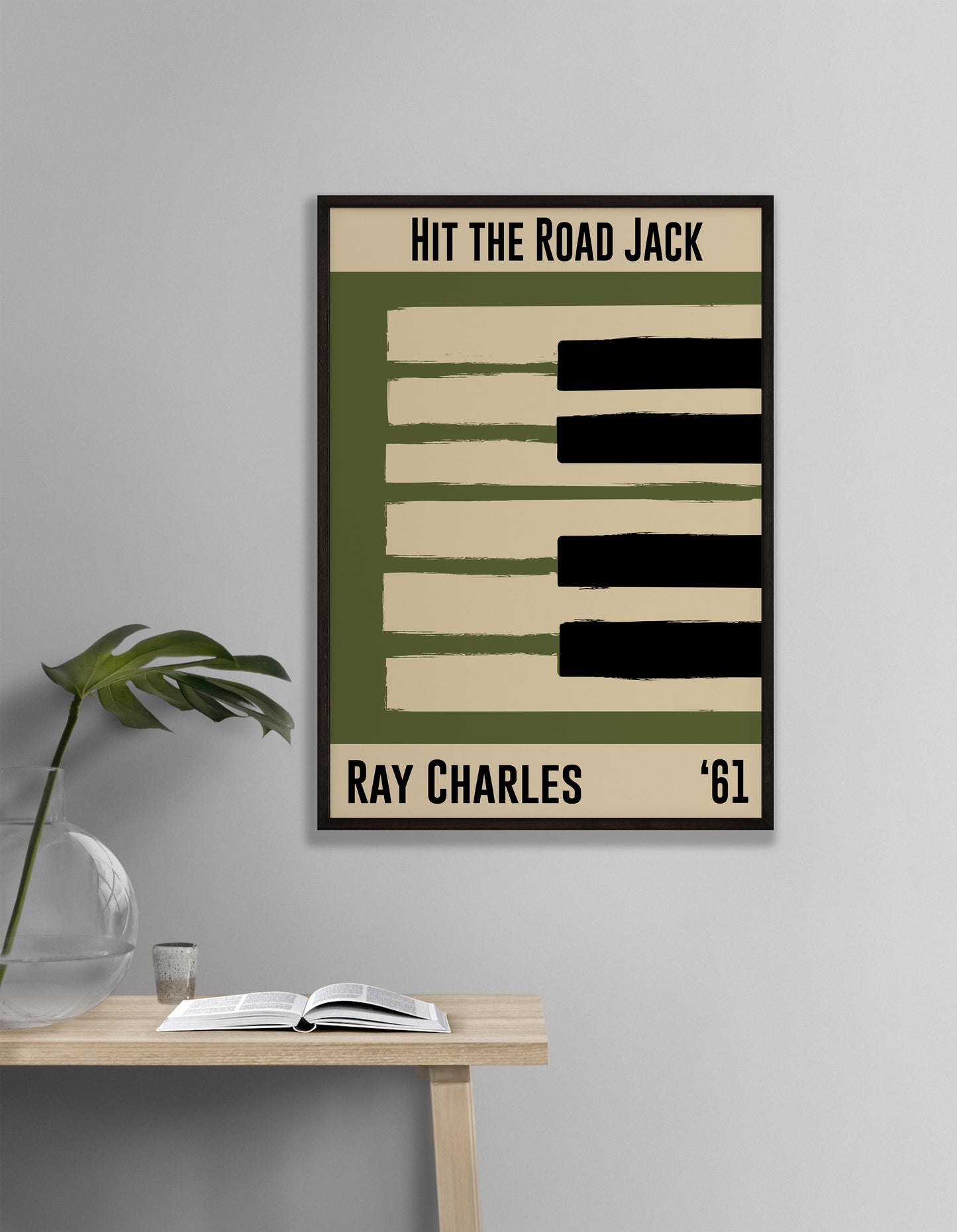 Olive green and cream piano design celebrating Ray Charles' Hit the Road Jack, released in 1961. Mocked up into black framed print hanging on a white living room wall