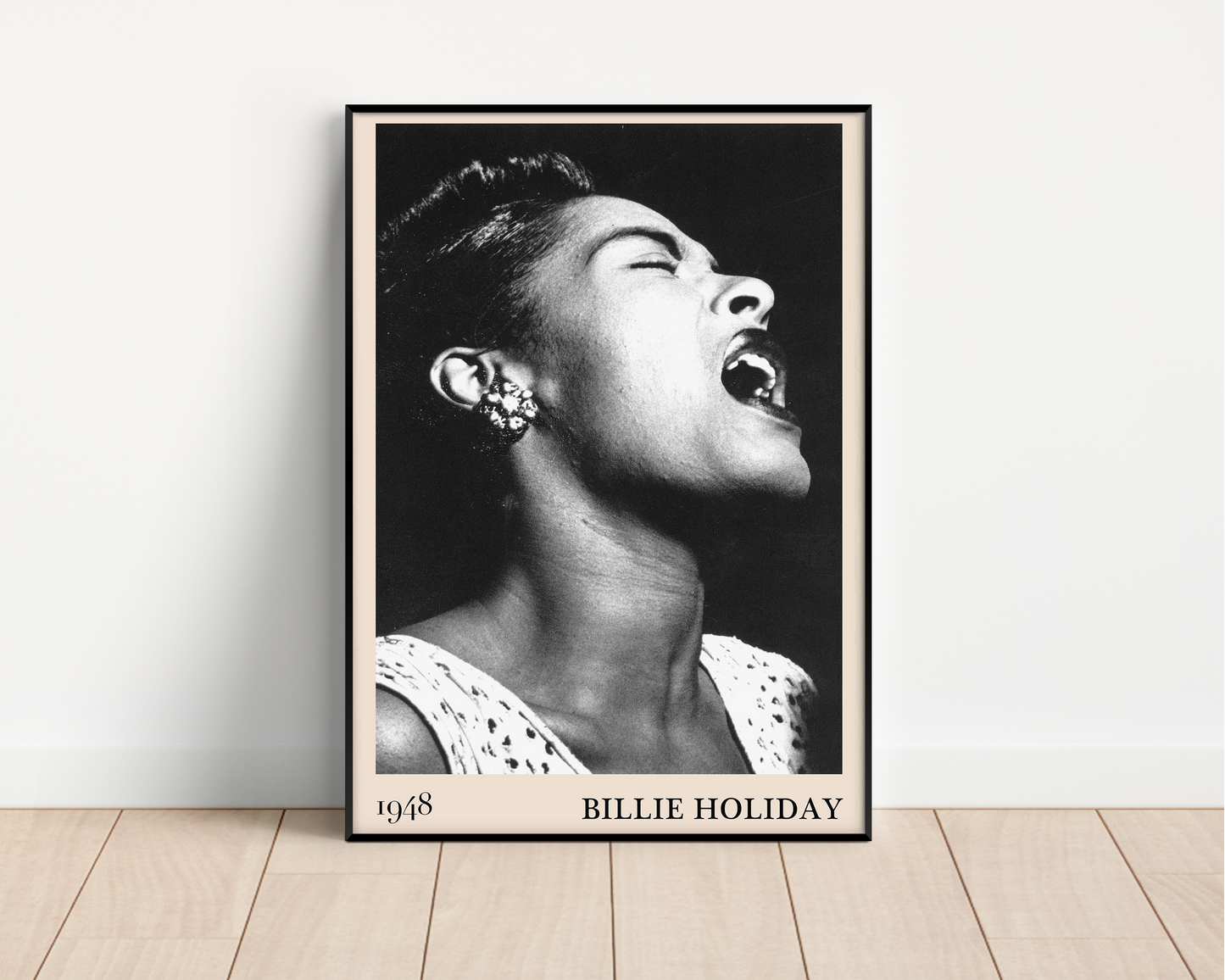 1948 photo of Billie Holiday crafted into an elegant black-framed print, leaning against a white wall