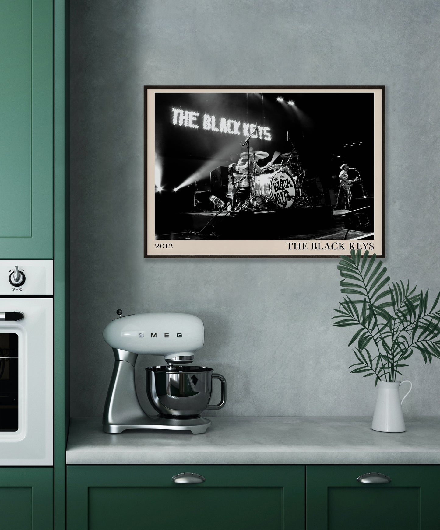 Black Keys photo from 2012 mocked up into a stylish looking vintage print, hanging on a grey kitchen wall