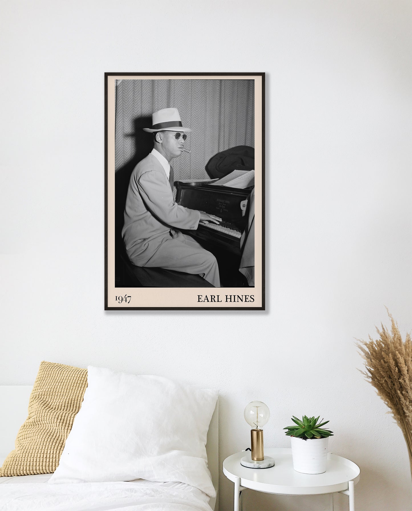 1947 photo of Earl Hines crafted into an elegant black-framed print. Hanging on a white bedroom wall