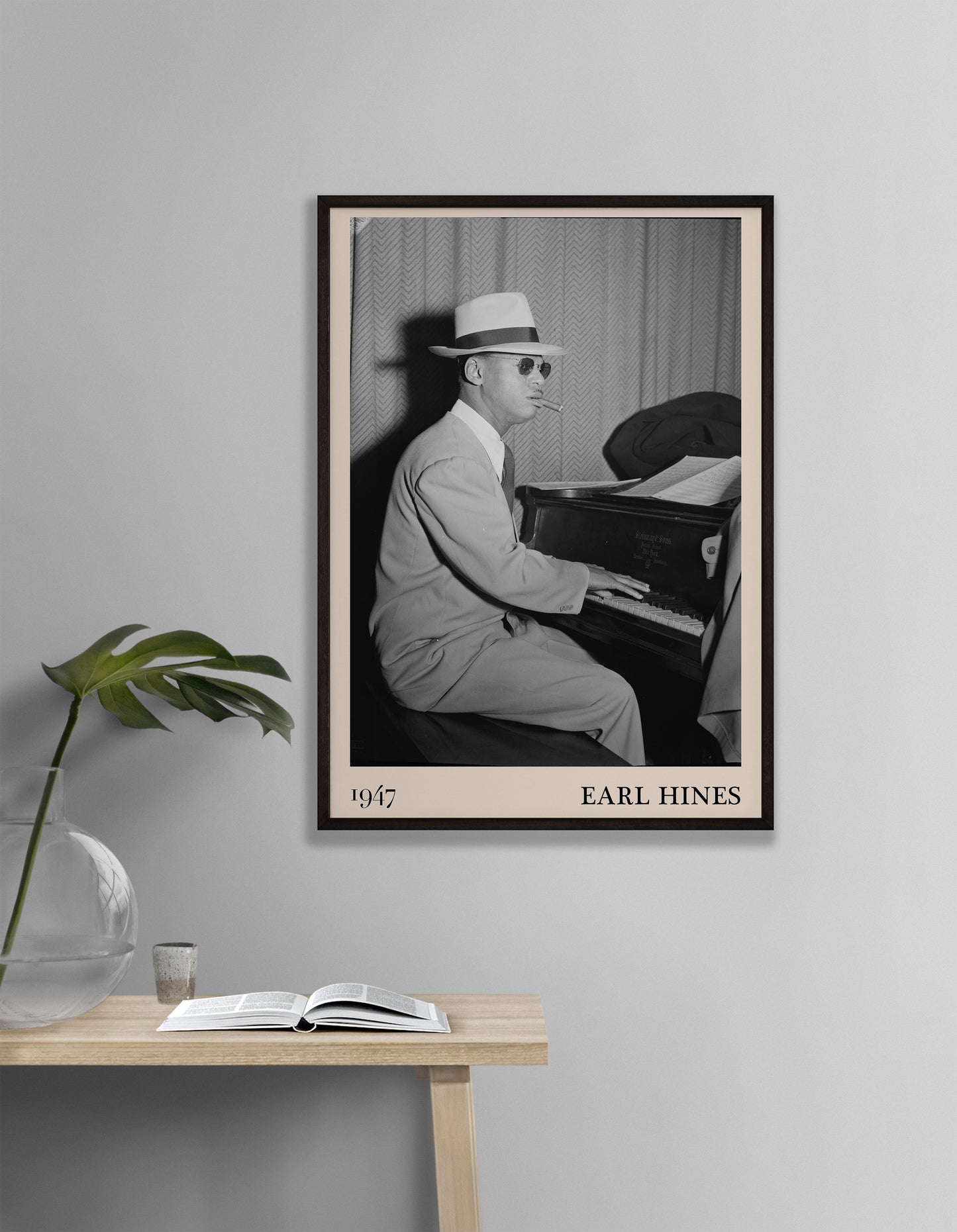 1947 photo of Earl Hines crafted into an elegant black-framed print. Hanging on a white living room wall