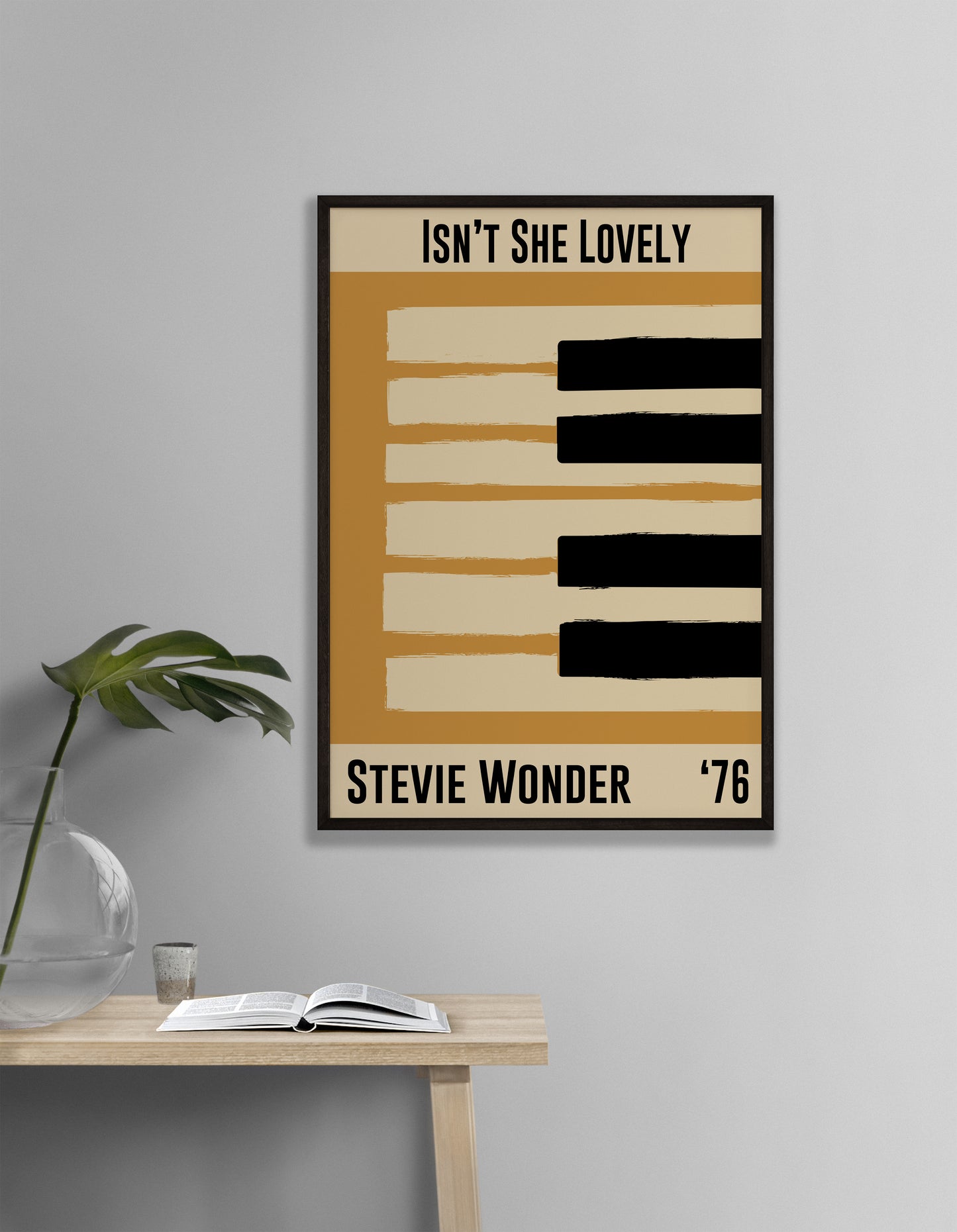 Yellow and cream piano design celebrating Stevie Wonder's Isn't She Lovely, released in 1976. Mocked up into black framed print hanging on a white living room wall