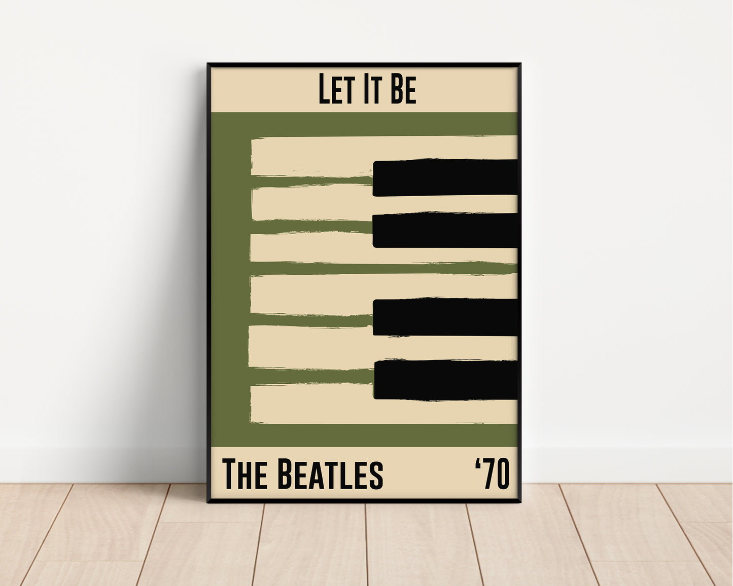 Olive green and cream piano design celebrating The Beatle's Let It Be, released in 1970. Mocked up into black framed print leaning against a white wall