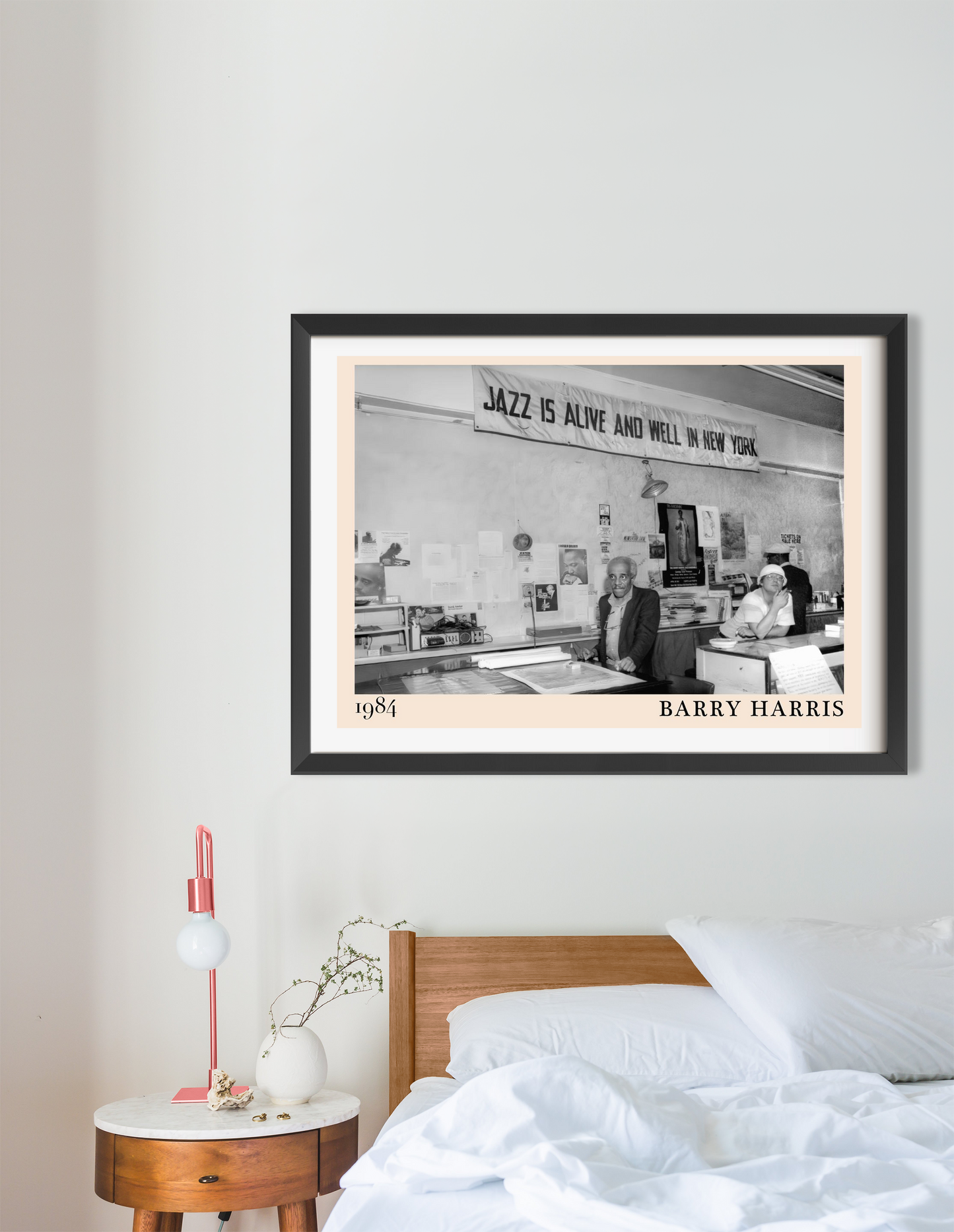 Barry Harris Retro Jazz Poster in landscape mount mockup above a wooden bed, featuring a black and white 1984 jazz scene.