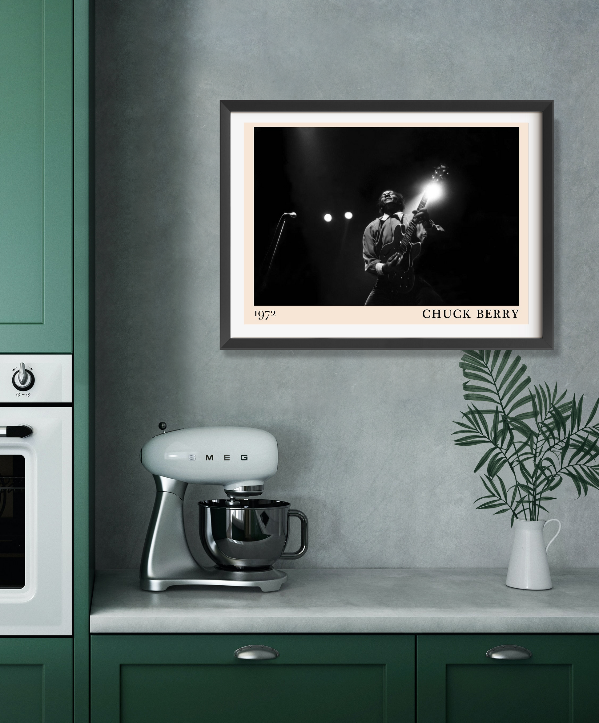 Chuck Berry Iconic Concert Poster in landscape mount, black-and-white design above kitchen counter with mixer and plant.