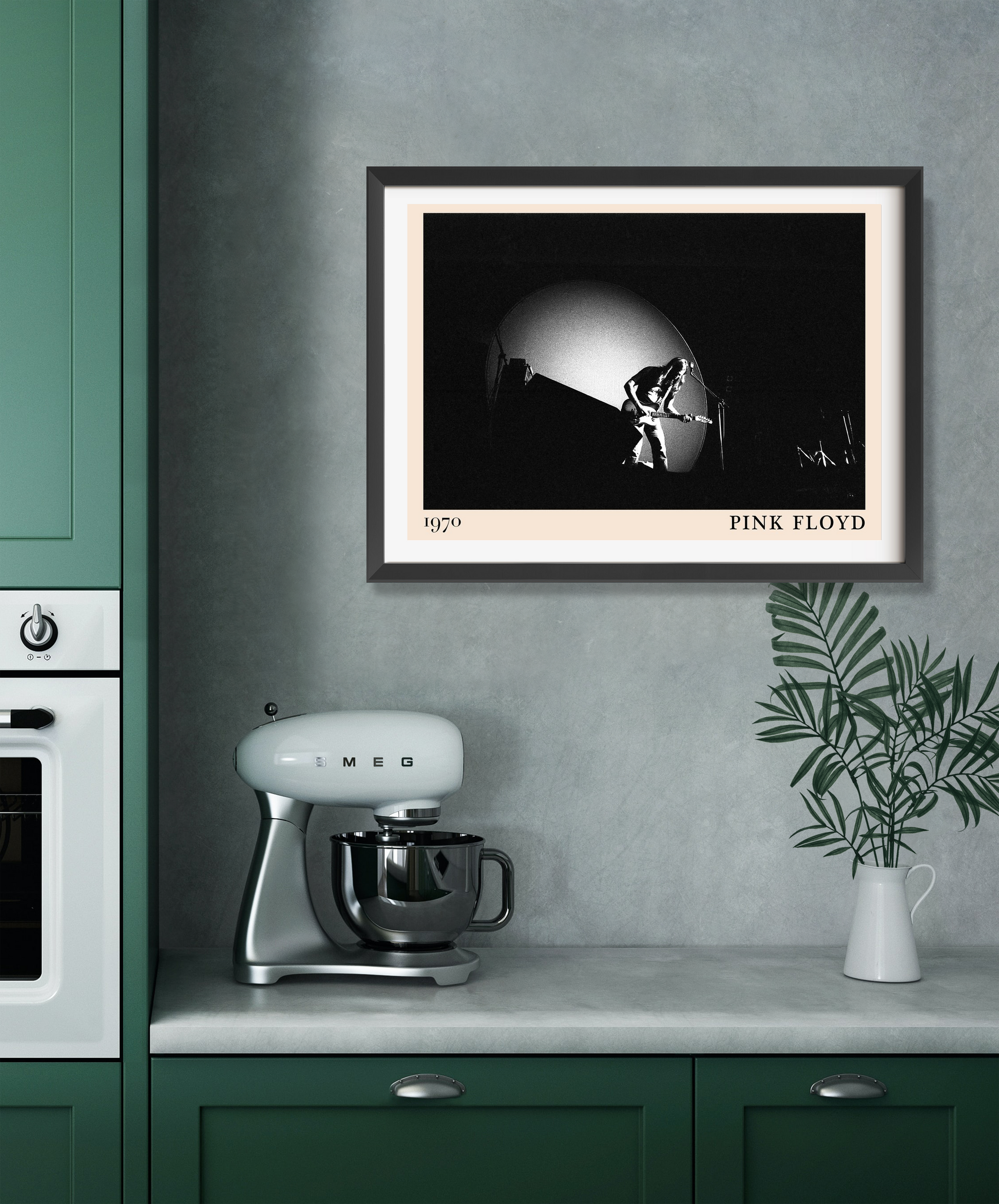 Pink Floyd Retro Rock Poster in landscape mount, black and white concert design above modern green kitchen counter setup.