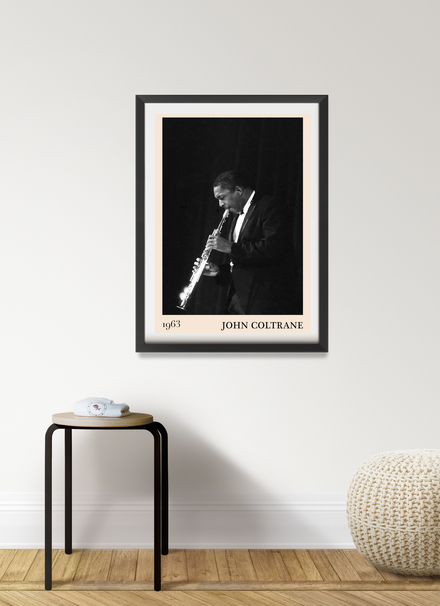 John Coltrane Jazz Poster in portrait 7 mount mockup, black and white design above modern wooden stool and pouf.