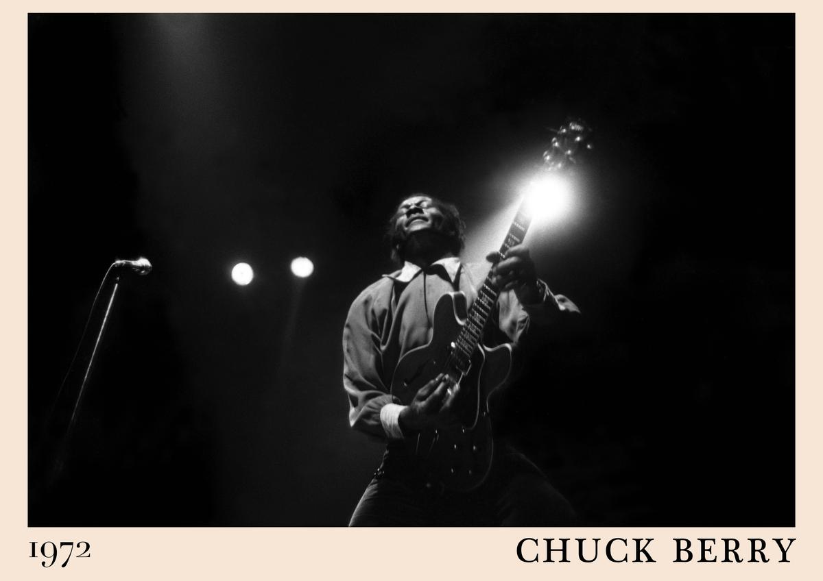 Poster featuring Chuck Berry playing guitar on stage, black and white 1972 concert photo with retro border and bold text,