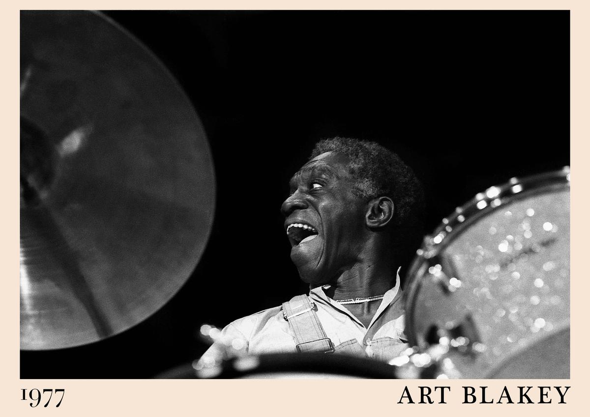 Poster featuring a black and white photo of Art Blakey drumming, 1977 date, bold retro border, perfect jazz wall art for