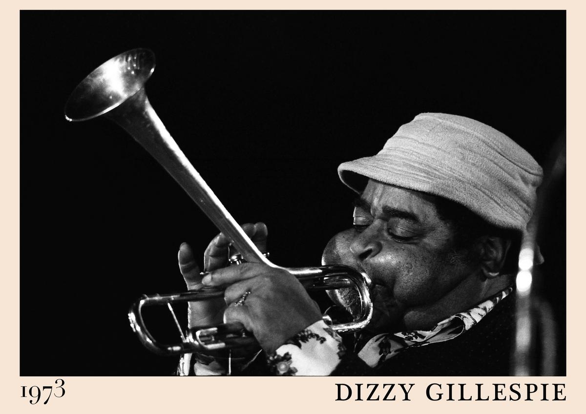 Poster featuring Dizzy Gillespie playing trumpet in 1973, black and white photo, beige border, retro jazz concert wall art