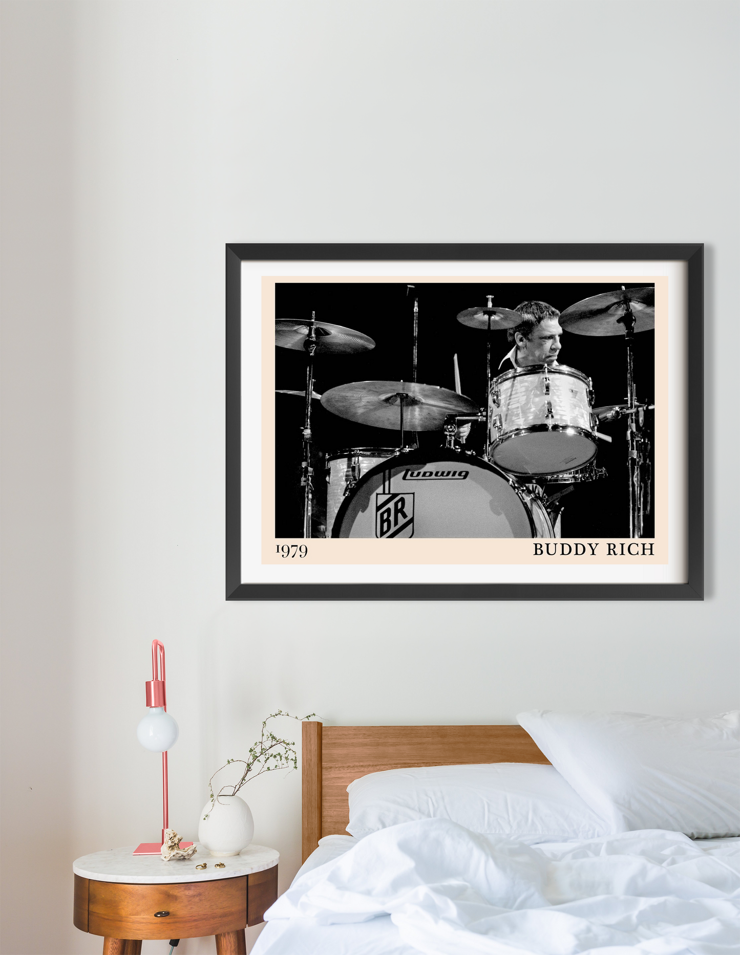 Buddy Rich Jazz Concert Print in landscape 16 mount above a modern bed, featuring black and white vintage drum set artwork.