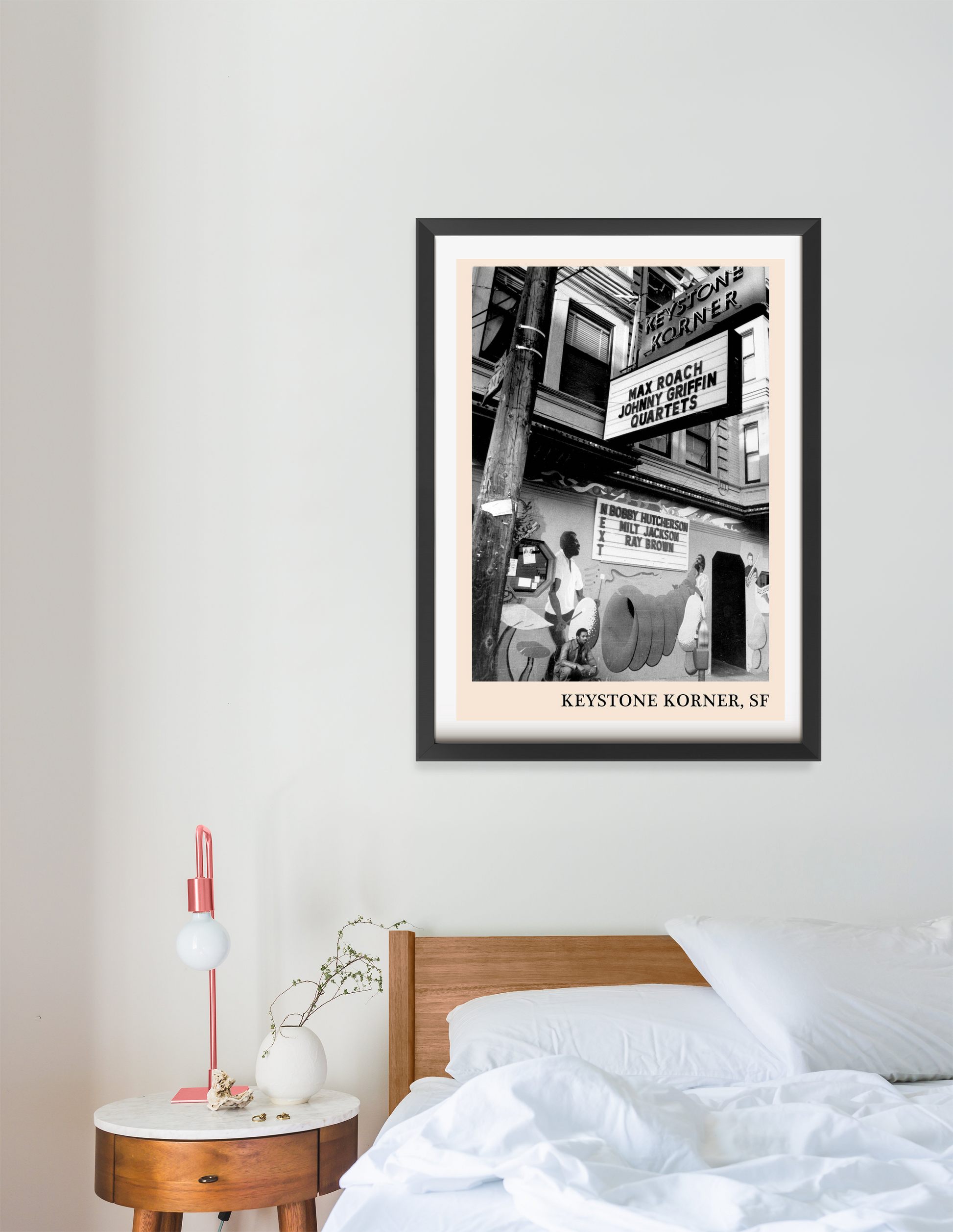 Keystone Korner Jazz Club Poster in portrait 16 mount, black and white design above a modern wood bed in a cozy bedroom.