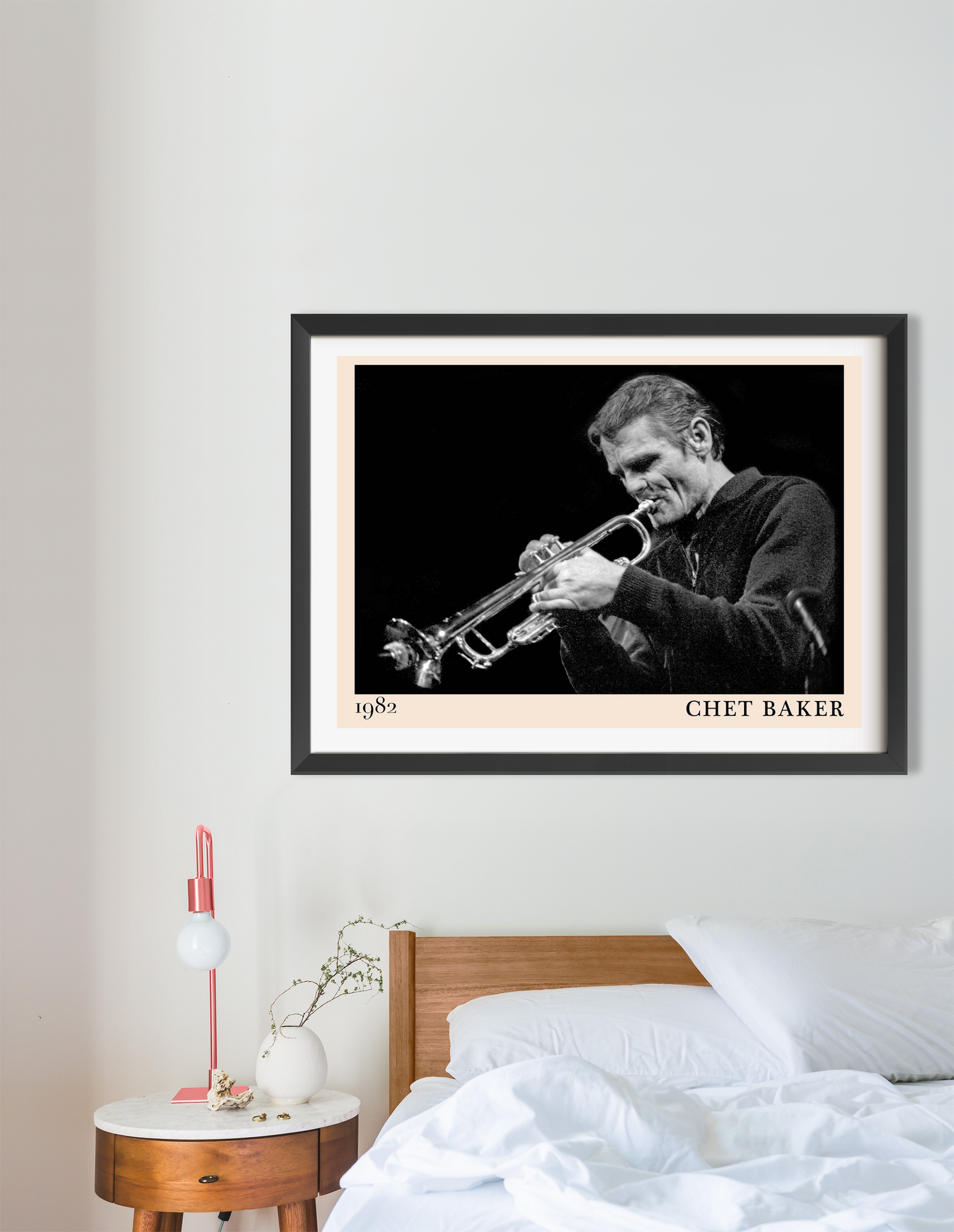 Chet Baker Concert Poster in landscape 16 mount above bed, black and white jazz design, modern bedroom décor setting