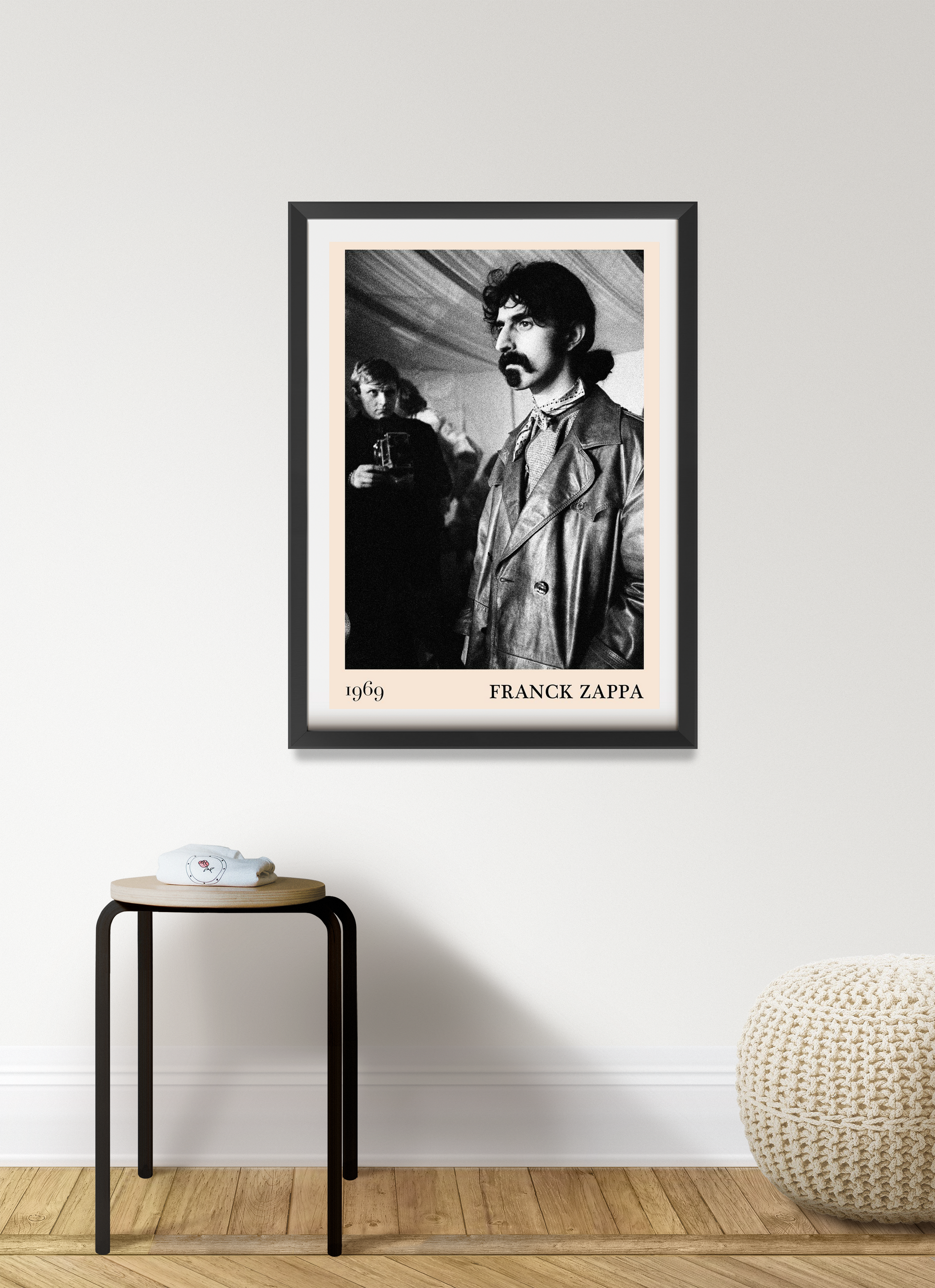 Franck Zappa Retro Concert Poster in black frame on white wall, vintage black and white portrait, styled in modern room.