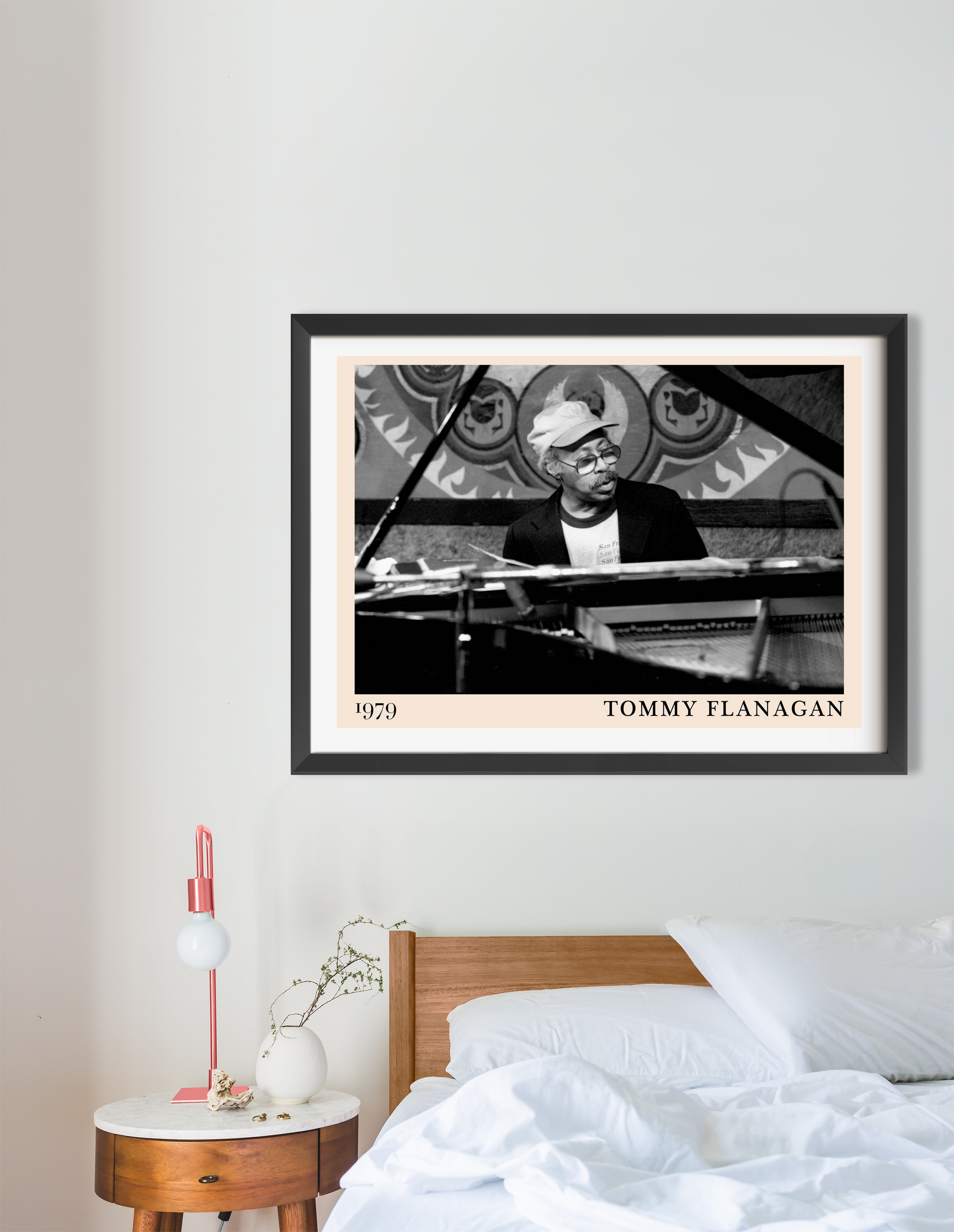 Landscape 16 Mount mockup featuring a framed Tommy Flanagan art print above a modern wooden bed in a cozy bedroom setting.