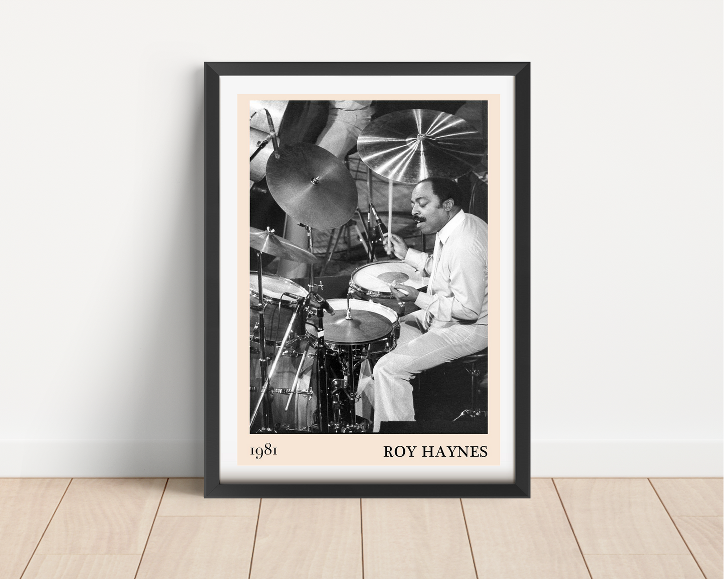 Roy Haynes Jazz Concert Poster in a portrait mount mockup, black frame on wood floor, features vintage 1981 drum performance.
