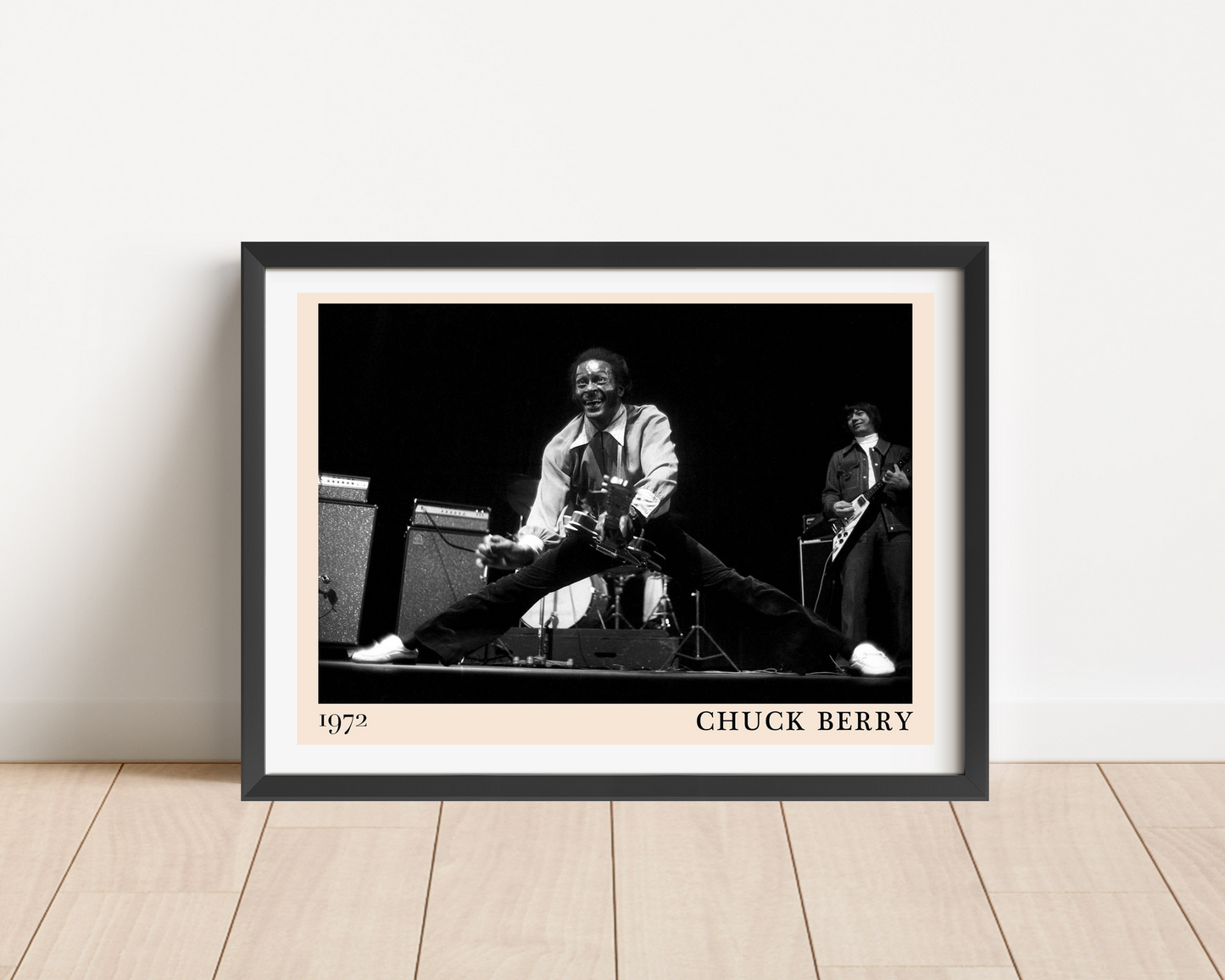 Chuck Berry Retro Rock Poster in a landscape frame mockup, black and white 1972 concert photo with bold vintage typography.