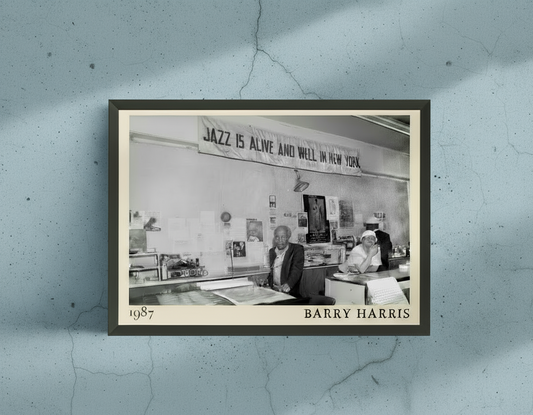 Barry Harris Retro Jazz Poster in landscape mockup, framed on a light blue concrete wall, features 1984 black and white jazz scene.