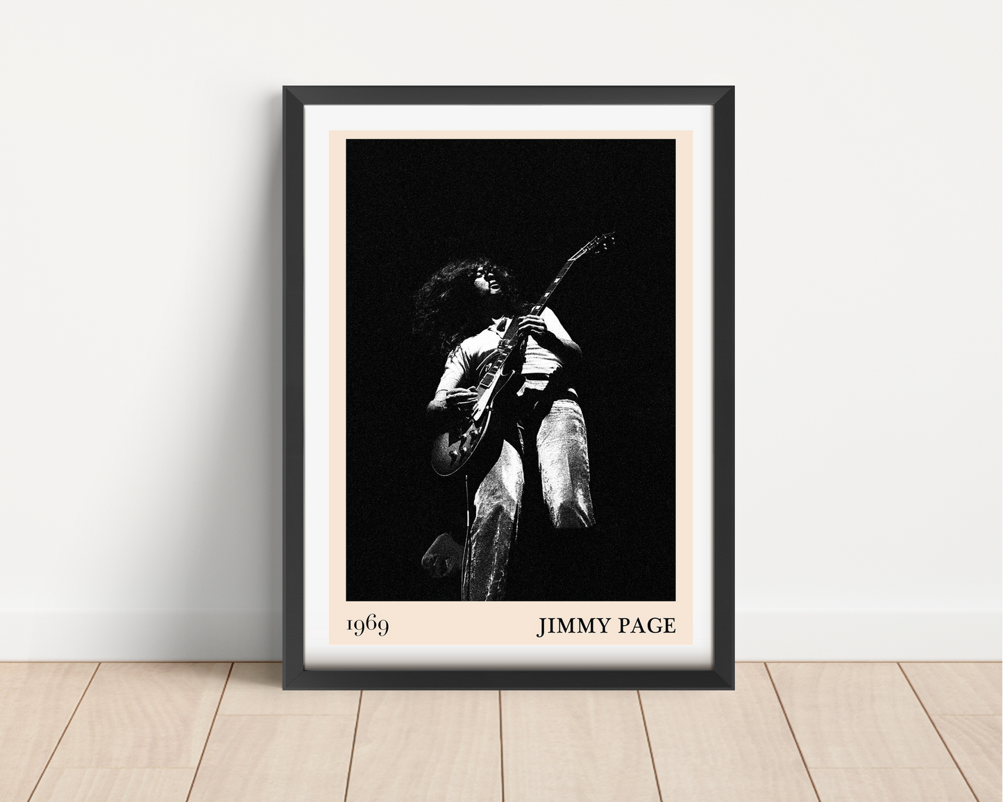 Jimmy Page Retro Rock Concert Poster in black frame, portrait mount on wood floor, bold monochrome 1969 stage photo design