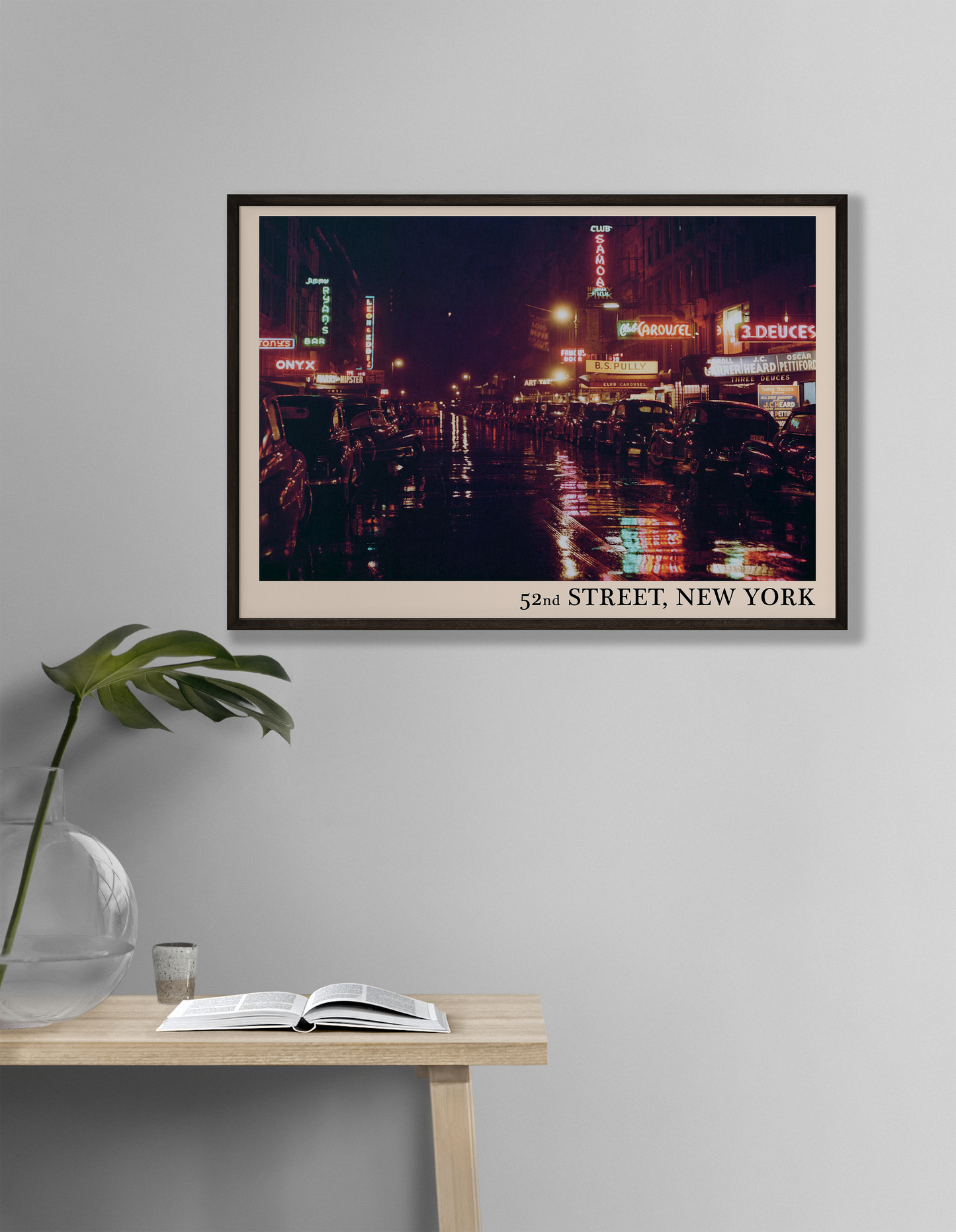 Iconic 52nd Street in New York captured in a retro black framed jazz venue print, hanging on a grey living room wall