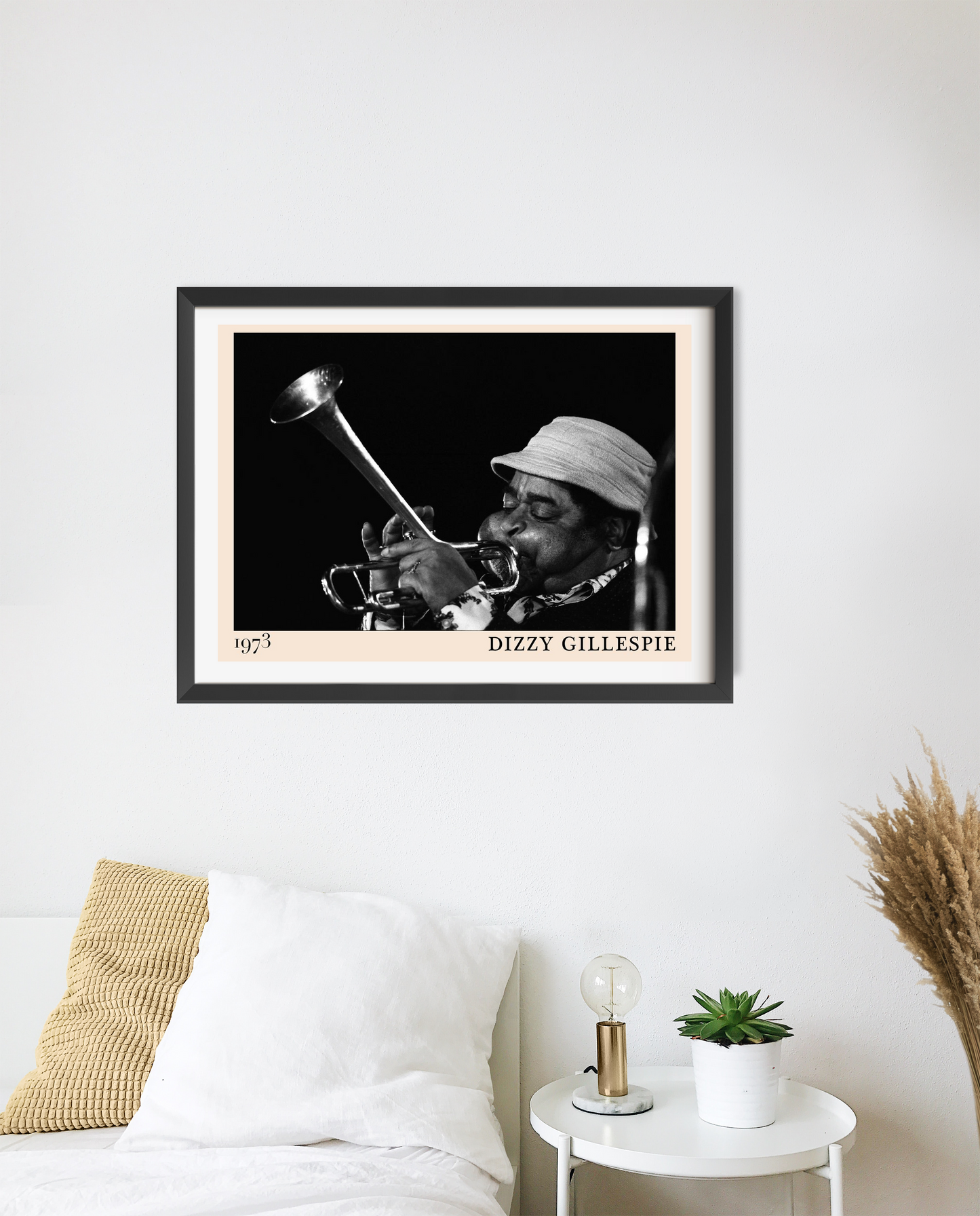 Dizzy Gillespie Jazz Concert Poster in landscape 20 mount mockup above modern bed, black and white trumpet design.