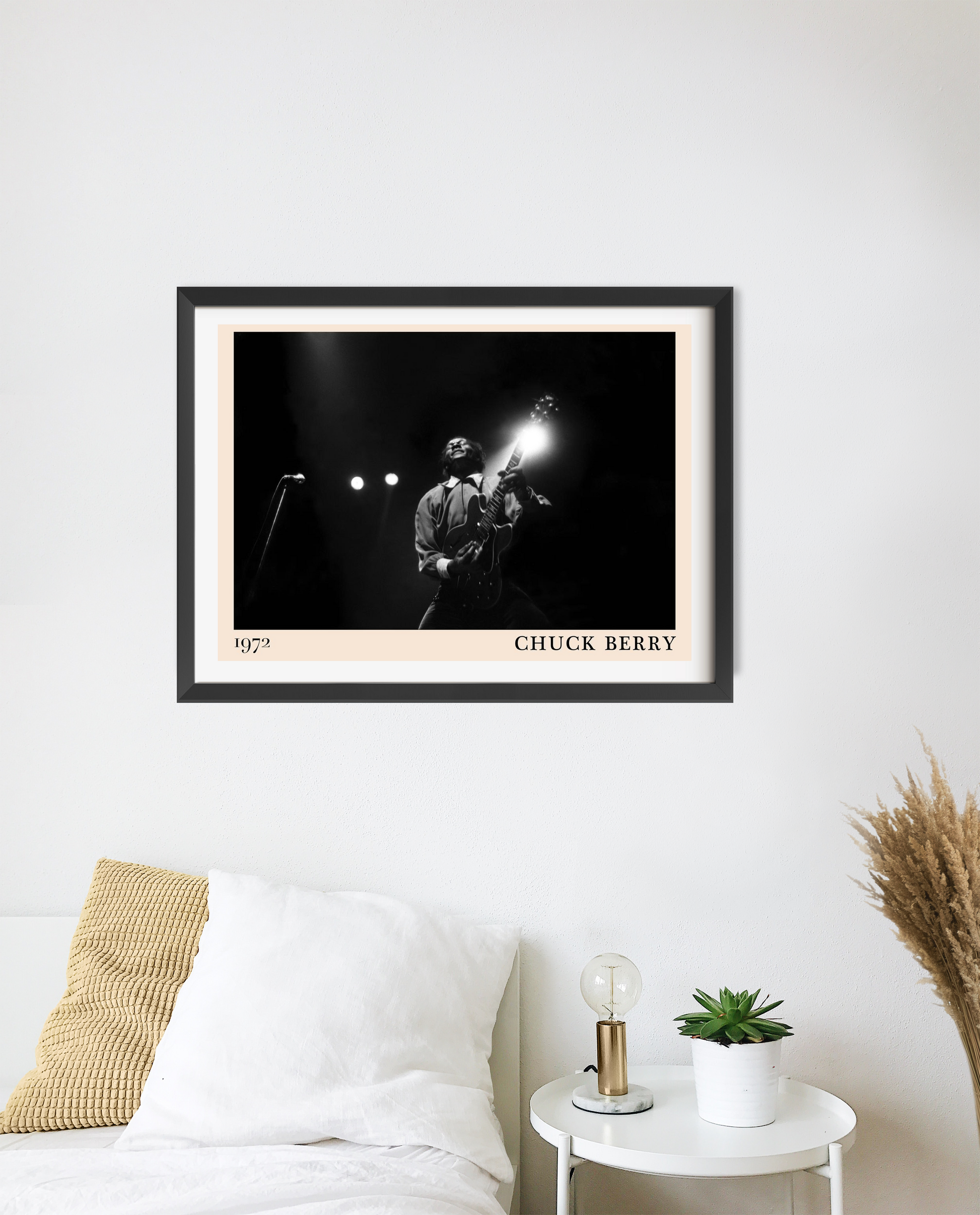 Chuck Berry Iconic Concert Poster in landscape mount above a white bed, featuring a black and white live performance photo.