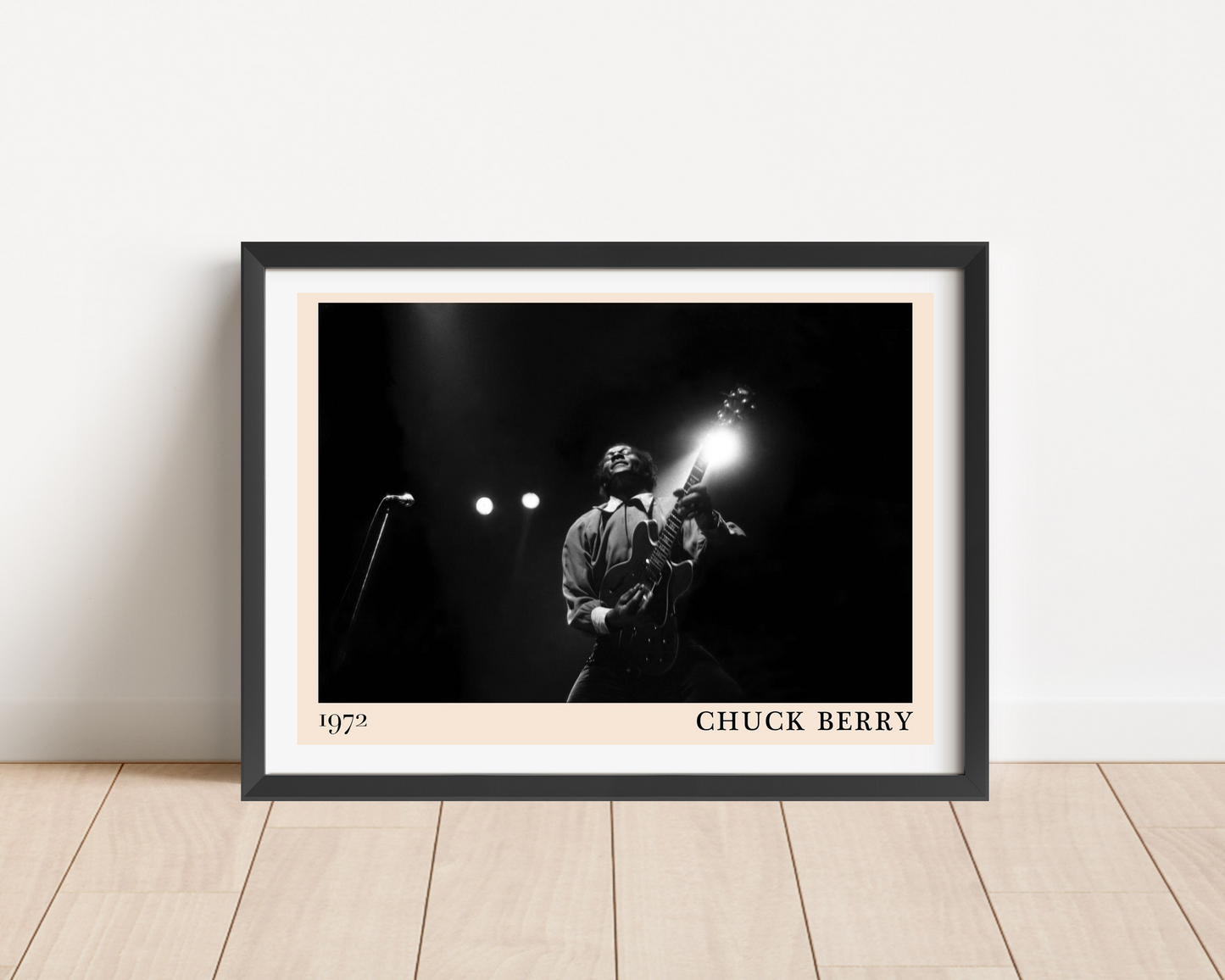 Chuck Berry Iconic Concert Poster in landscape mount mockup, black and white stage photo, framed on wooden floor