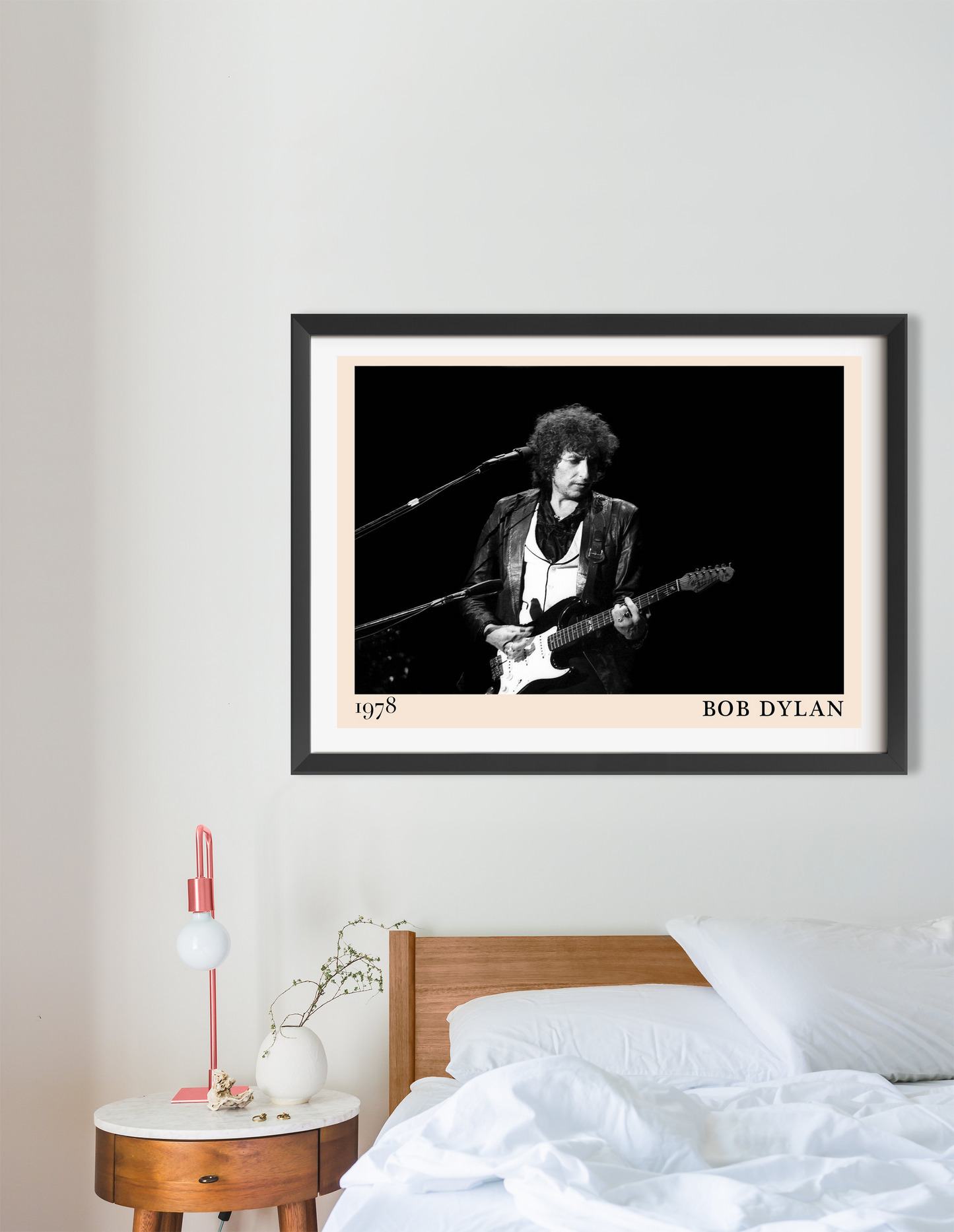 Bob Dylan Folk Concert Poster in landscape 16 mount mockup above a modern bed, black and white design with 1978 date.