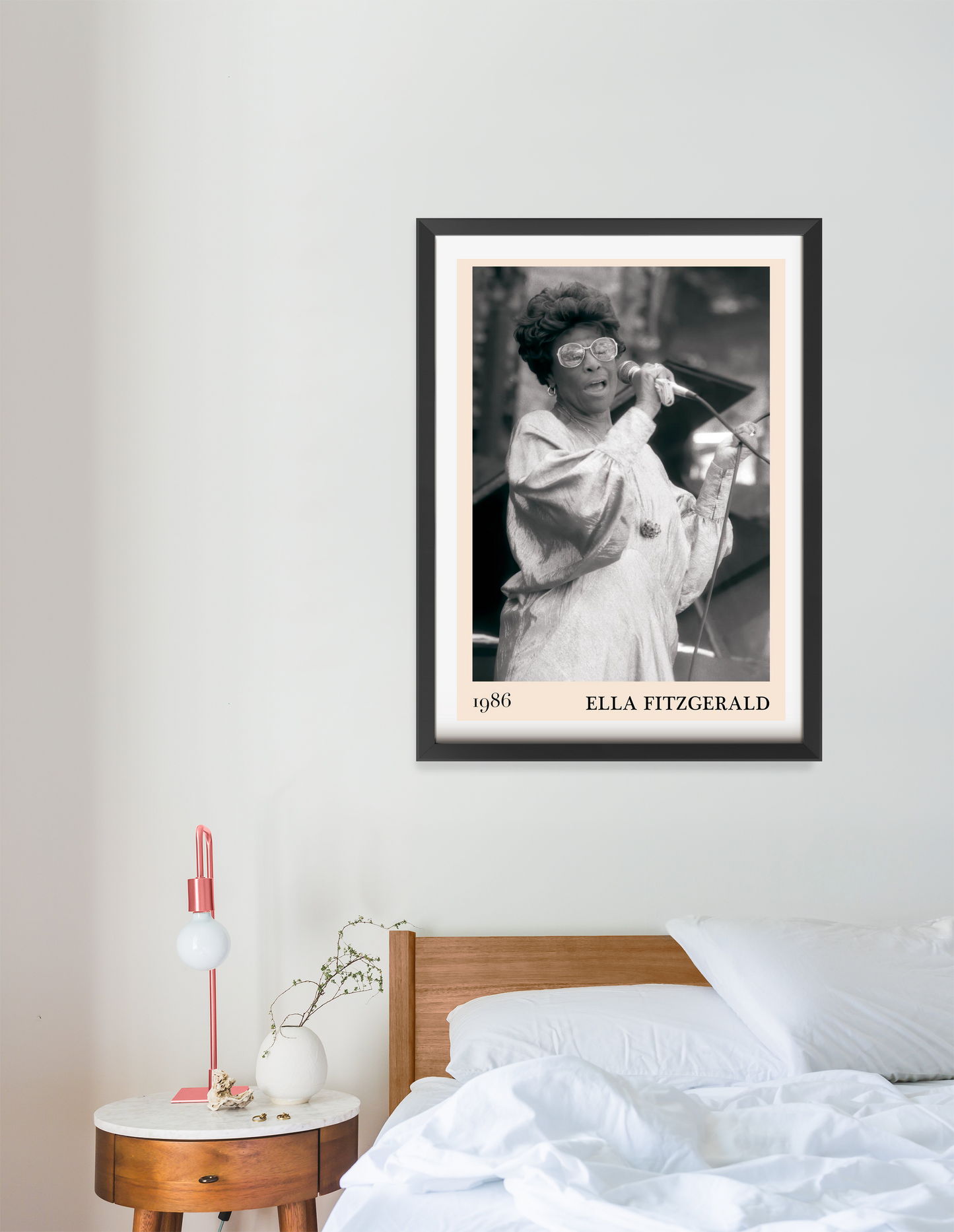 Ella Fitzgerald Retro Jazz Print in portrait 16 mount above a modern bed, black and white design featuring singer with microp