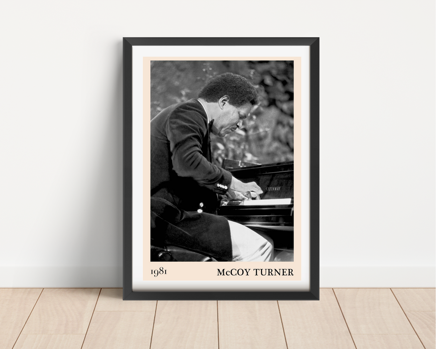 McCoy Turner Jazz Piano Print in portrait mount mockup, black and white pianist artwork framed on minimalist floor.