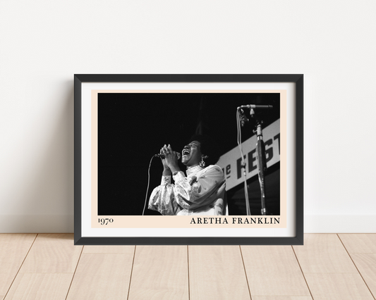 Aretha Franklin vintage jazz poster in landscape frame mockup, featuring black and white 1970 performance photo on wood floor
