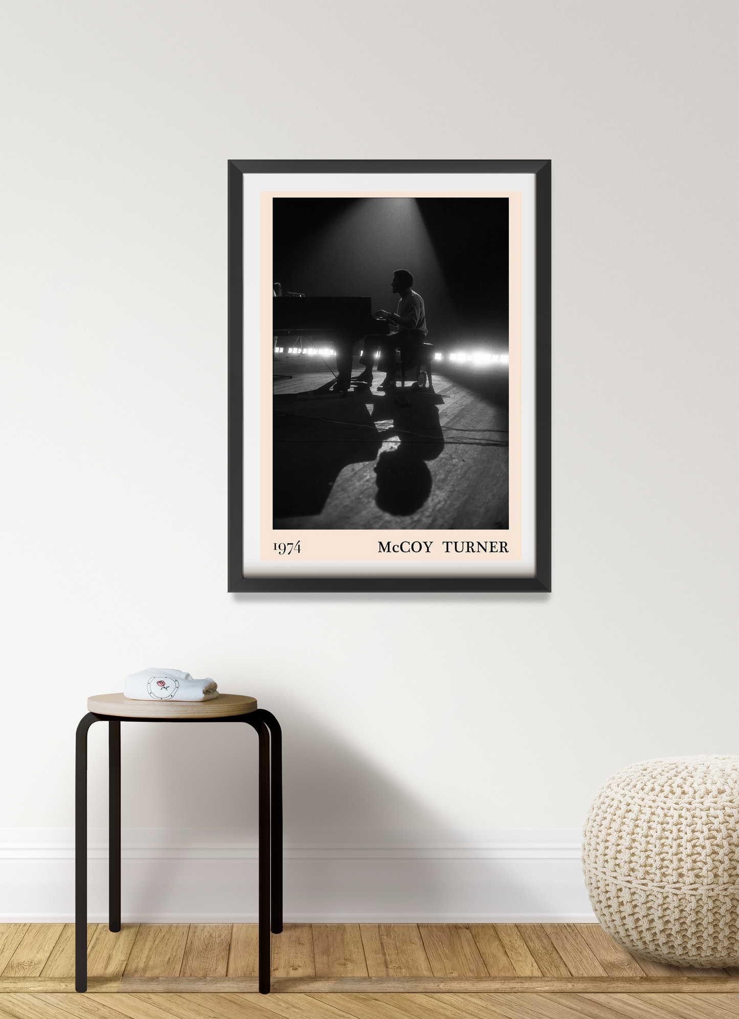 McCoy Turner Jazz Concert Poster in Portrait 7 Mount mockup, black frame on white wall, pianist silhouette stage design.
