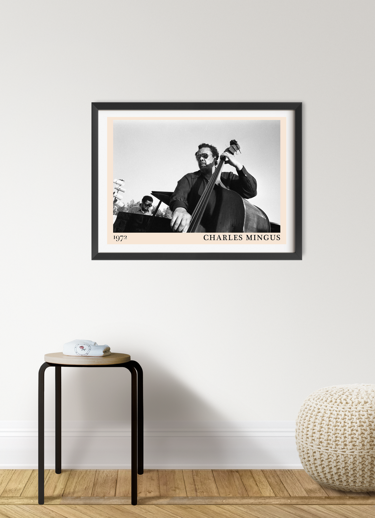 Charles Mingus Cool Jazz Poster in landscape 7 mount mockup, black frame on modern wall, black and white jazz design.