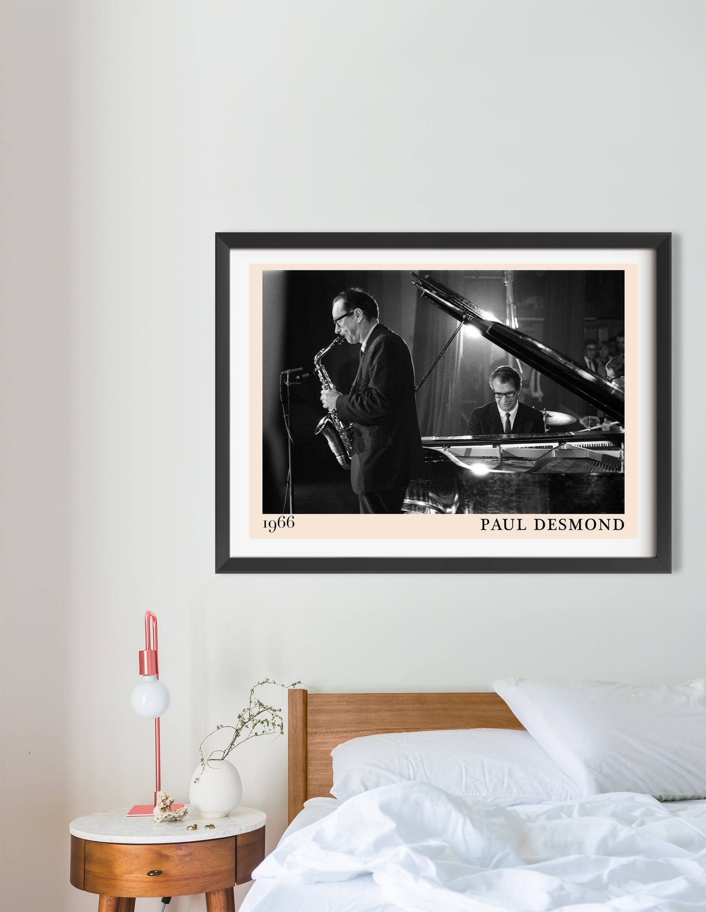 Paul Desmond Retro Jazz Poster in a landscape 16 mount above a modern bed, featuring a black and white jazz performance scene