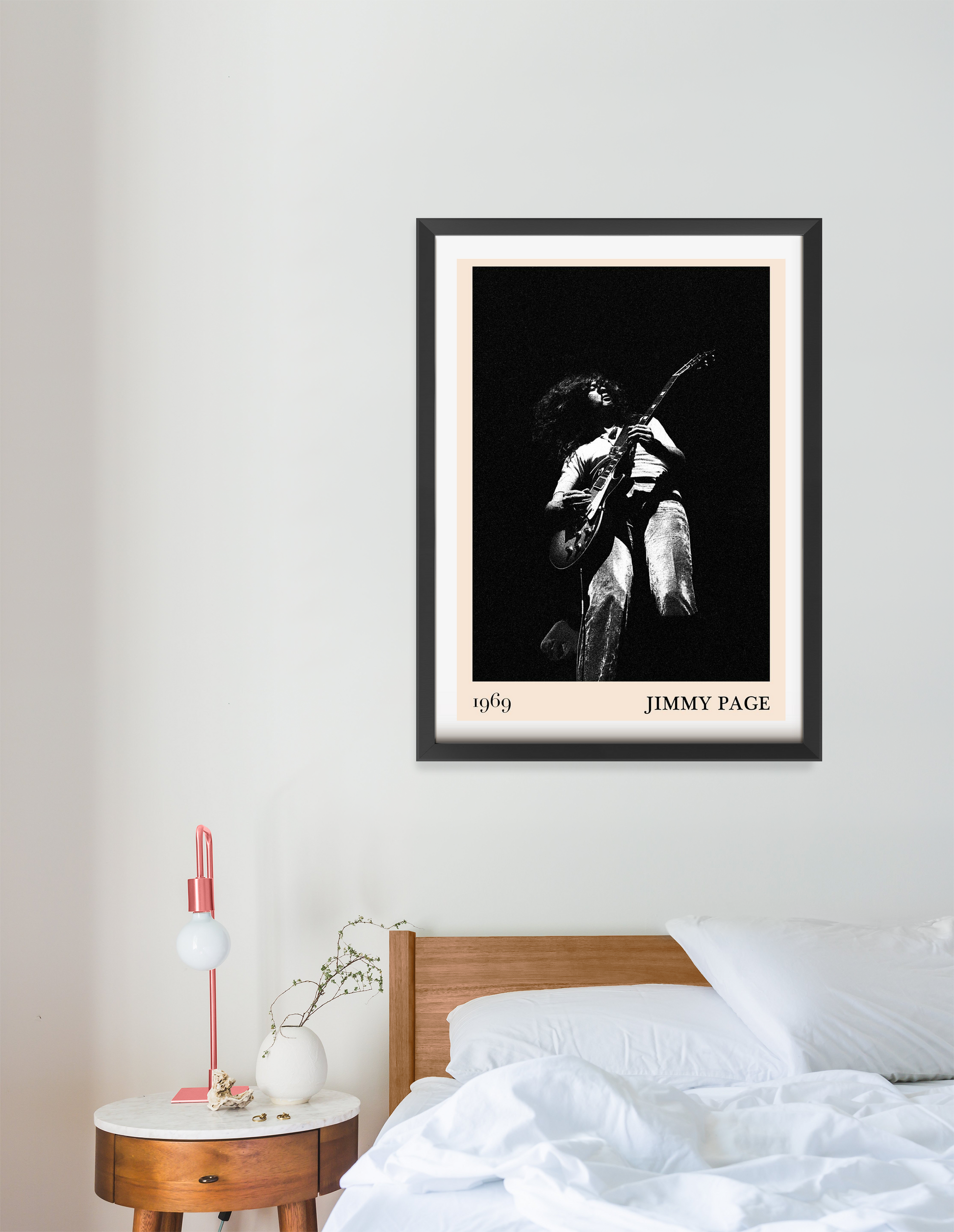 Jimmy Page Retro Rock Concert Poster in portrait 16 mount mockup above a modern bed, black and white guitar design, bedroom d
