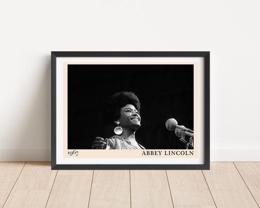 Abbey Lincoln Retro Jazz Poster in landscape mount mockup, black and white portrait design, framed on wooden floor.