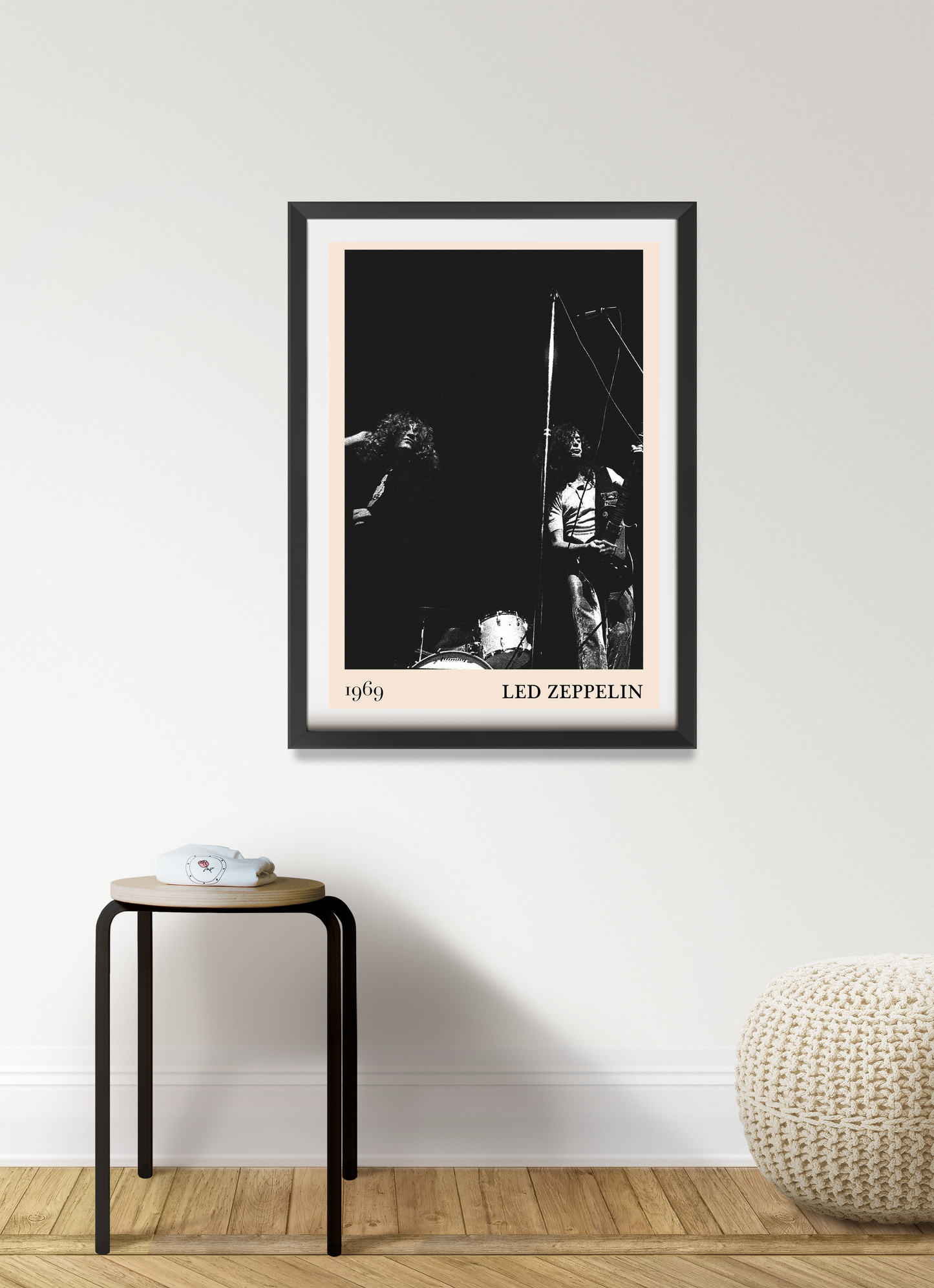 Led Zeppelin vintage rock poster in black frame, portrait 7 mount, features 1969 concert photo on modern living room wall.