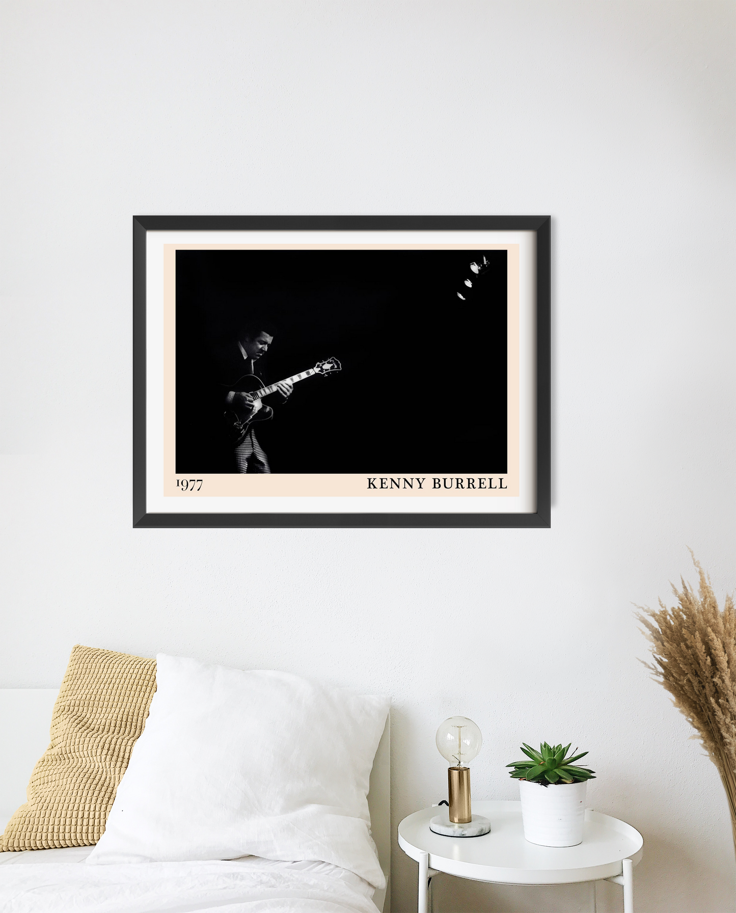 Kenny Burrell Jazz Concert Poster in landscape 20 mount mockup, black and white design above modern bedroom decor.