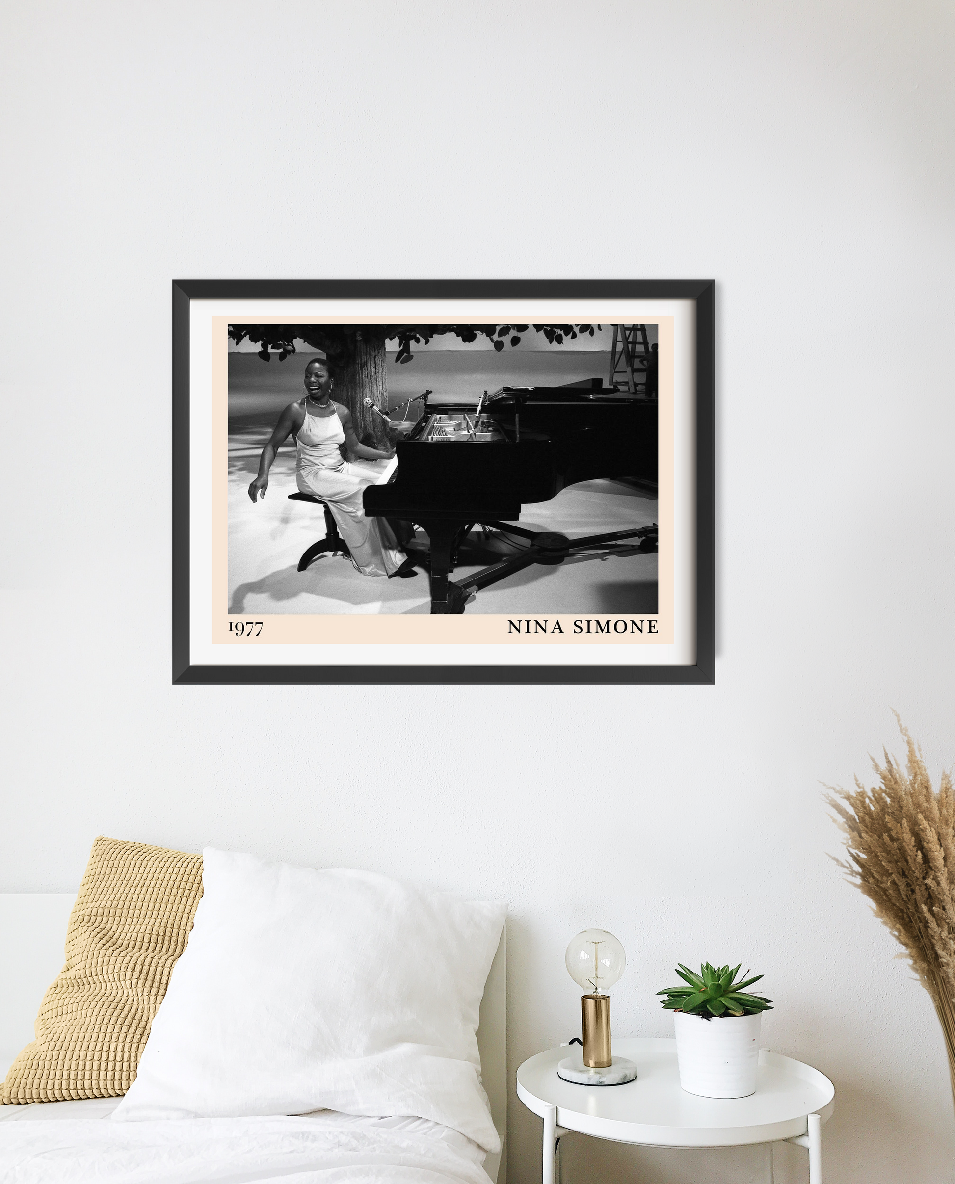 Nina Simone vintage poster in a 20 mount landscape mockup, black and white design above modern bed and side table decor.