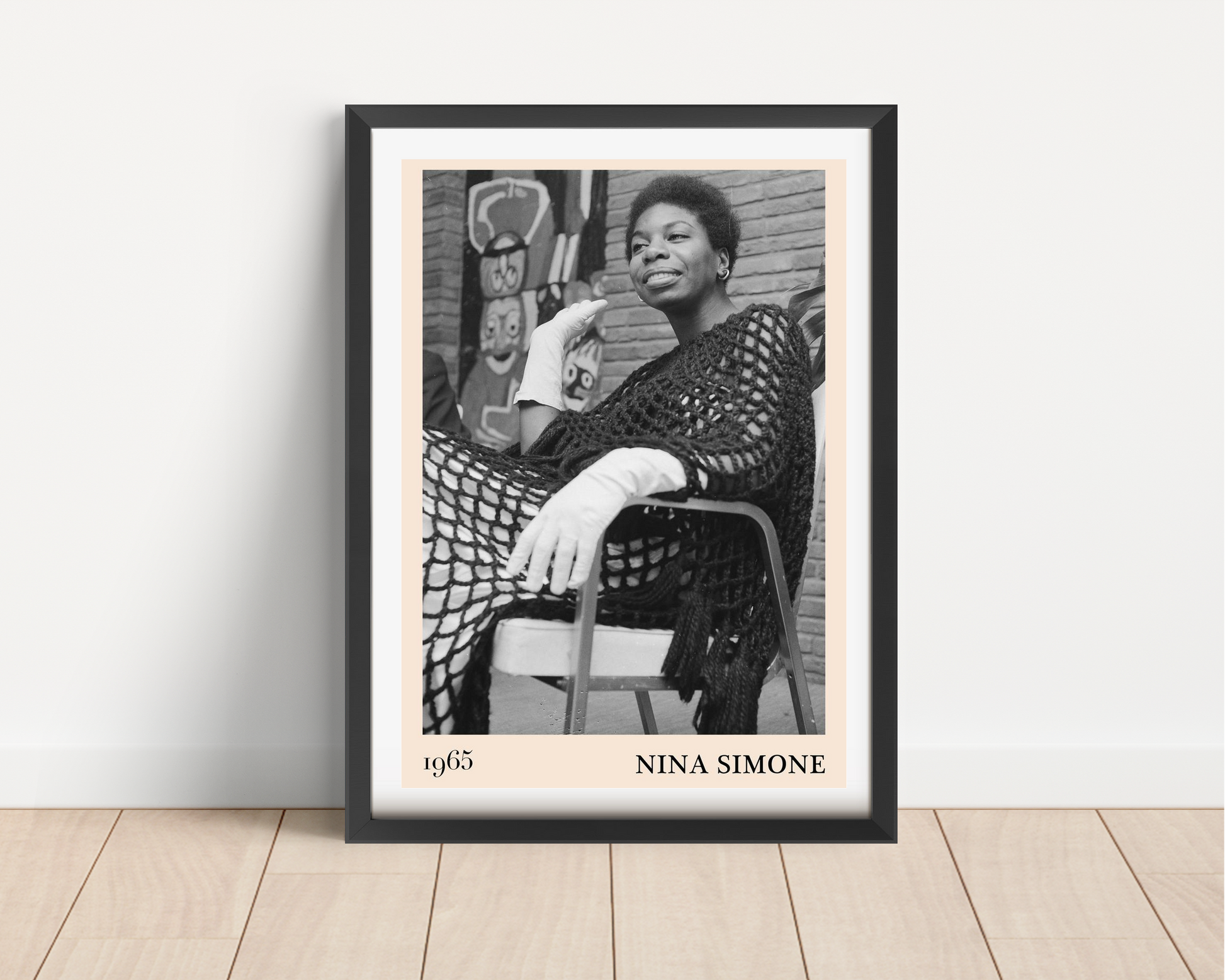 Nina Simone Jazz Print in portrait mount mockup, black frame on wood floor, features vintage 1965 photo and bold text.