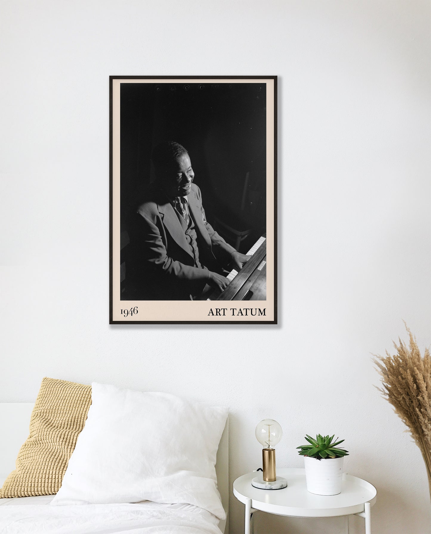 1946 photograph of Art Tatum crafted into a cool framed music print. The poster has an off-white border and a thin black frame. The poster is hanging on a white bedroom wall