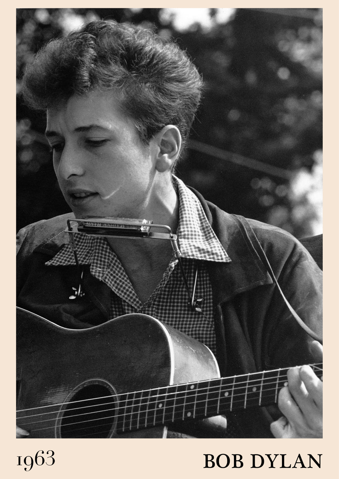 1963 photograph of Bob Dylan playing blues guitar.Crafted into cool blues poster.