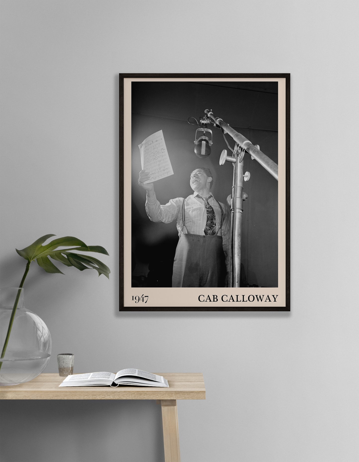 Cool 1947 photo of Cab Calloway crafted into  black framed jazz poster, hanging on a living room wall