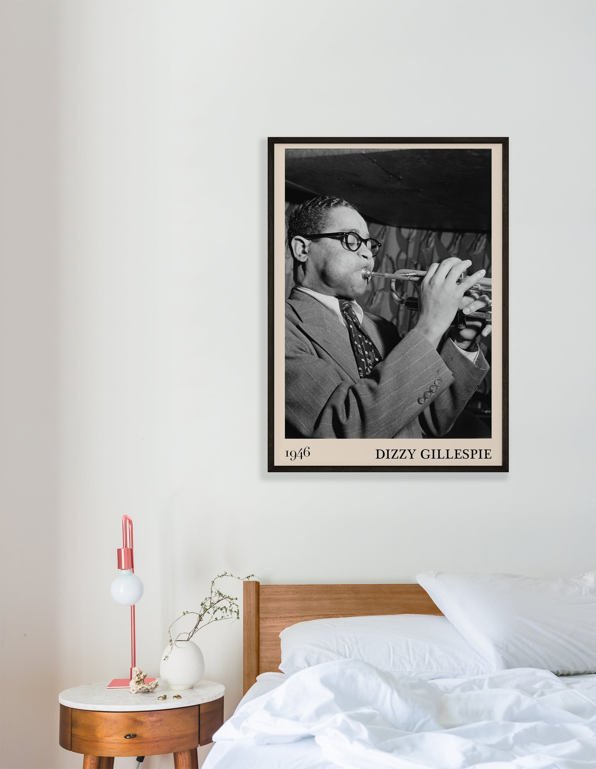 Cool 1946 photo of Dizzy Gillespie crafted into black framed print, hanging on a bedroom wall