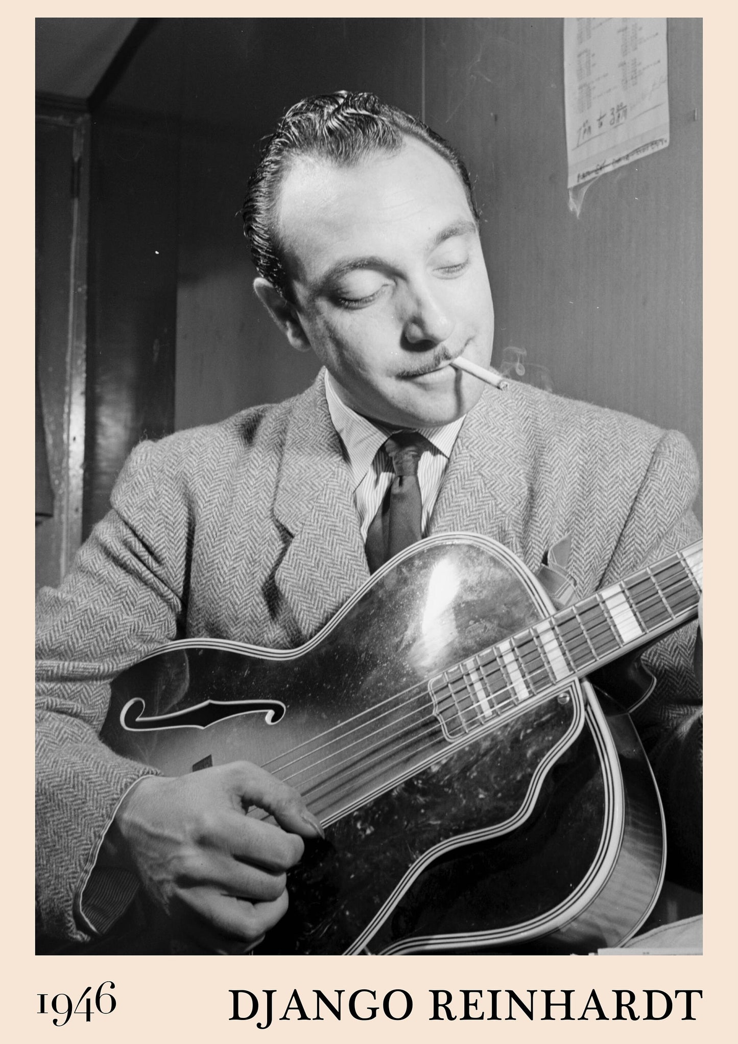 1946 photograph of Django Reinhardt playing the guitar. Transformed into a retro jazz poster