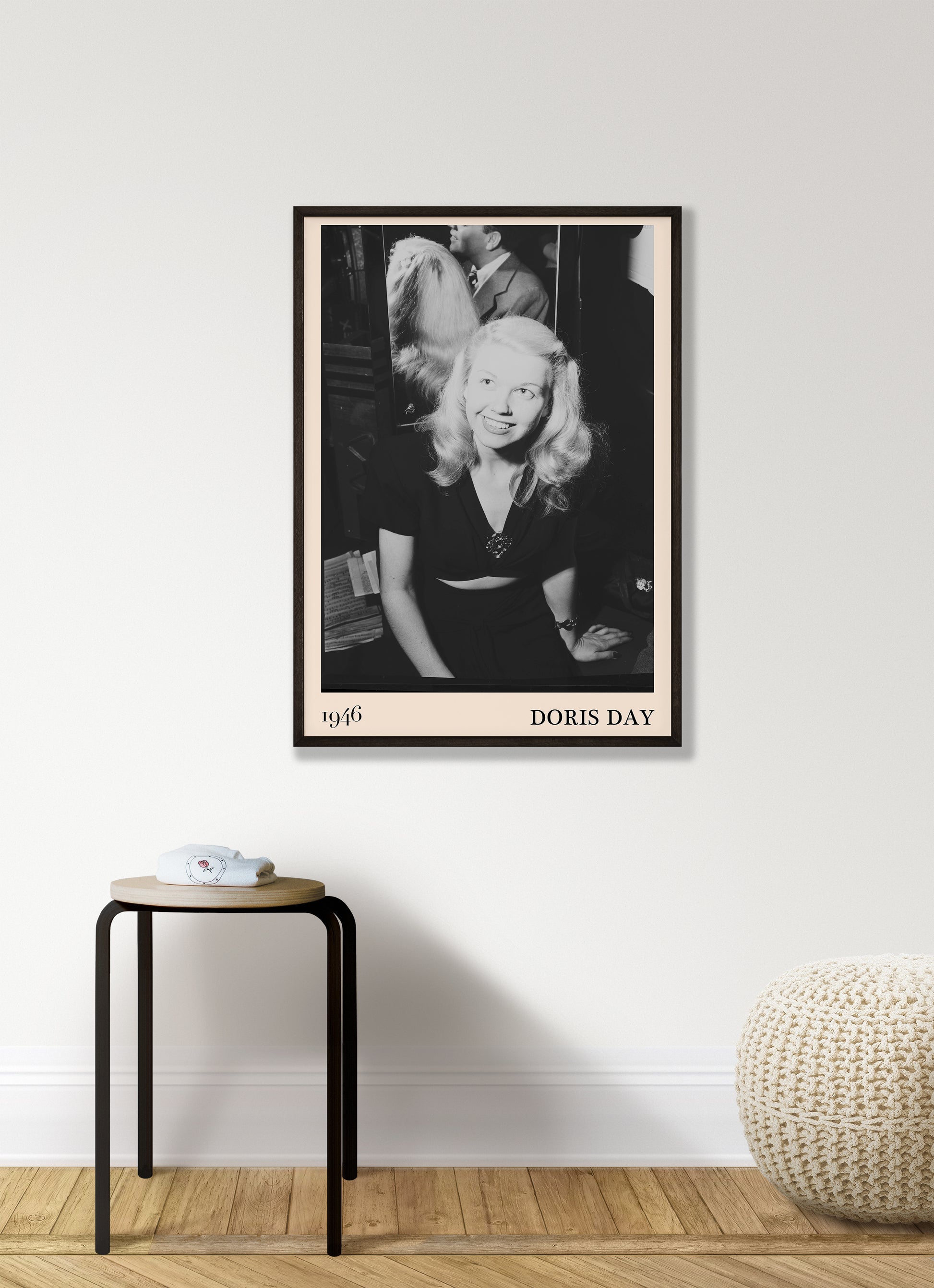 1946 photograph of  Doris Day. Transformed into a stylish black-framed jazz poster resting hanging on a white living room wall