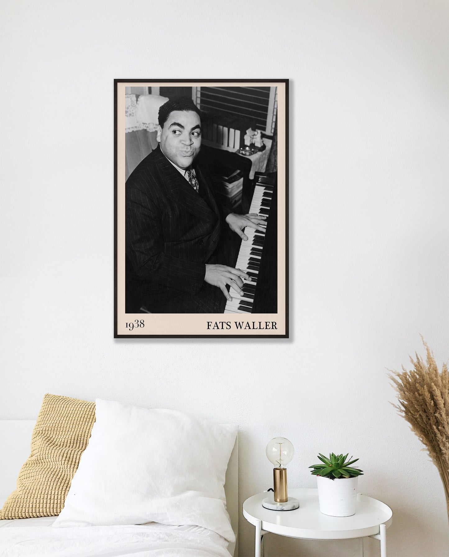 1938 photograph of Fats Waller crafted into a cool black framed jazz poster. The poster is hanging on a white bedroom room wall.